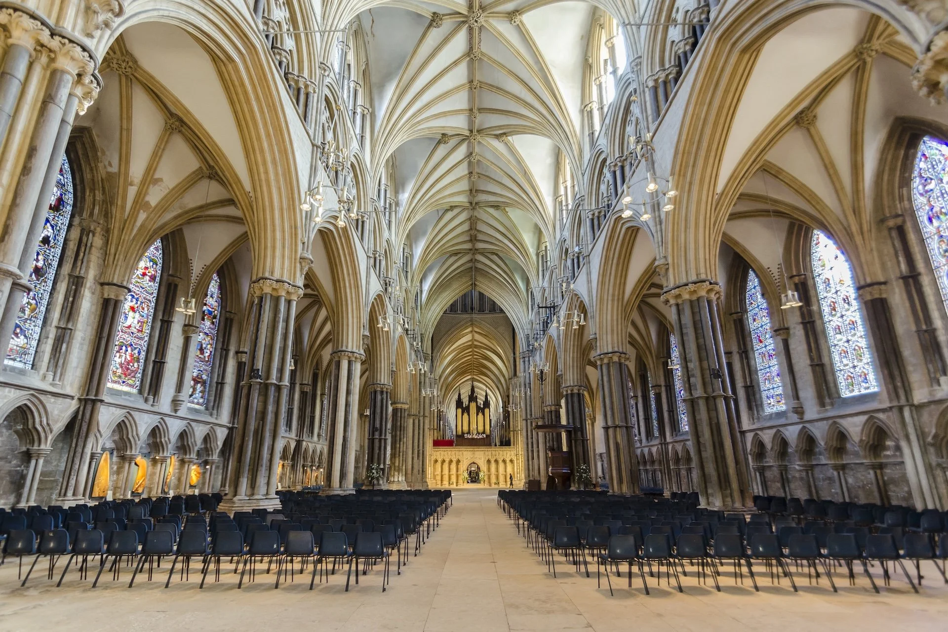Vaulted Gothic interior of Lincoln Cathedral, looking along the nave.