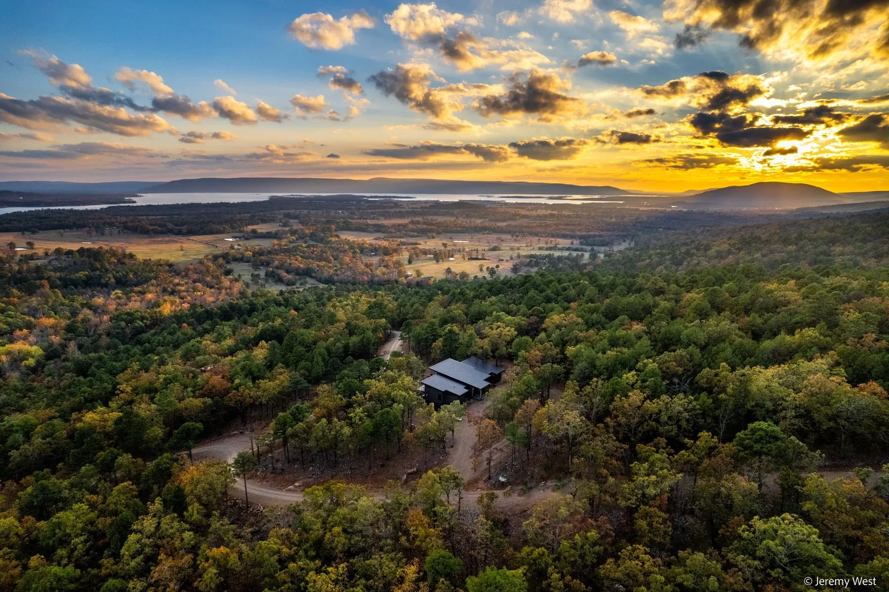 Gated community for second home buyers offering scenic ridgelines and forested land in SE Oklahoma.