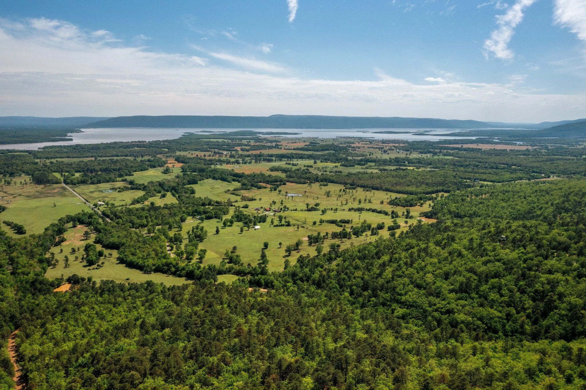 Panoramic mountain and lake views from a luxury acreage homesite in Southeast Oklahoma.