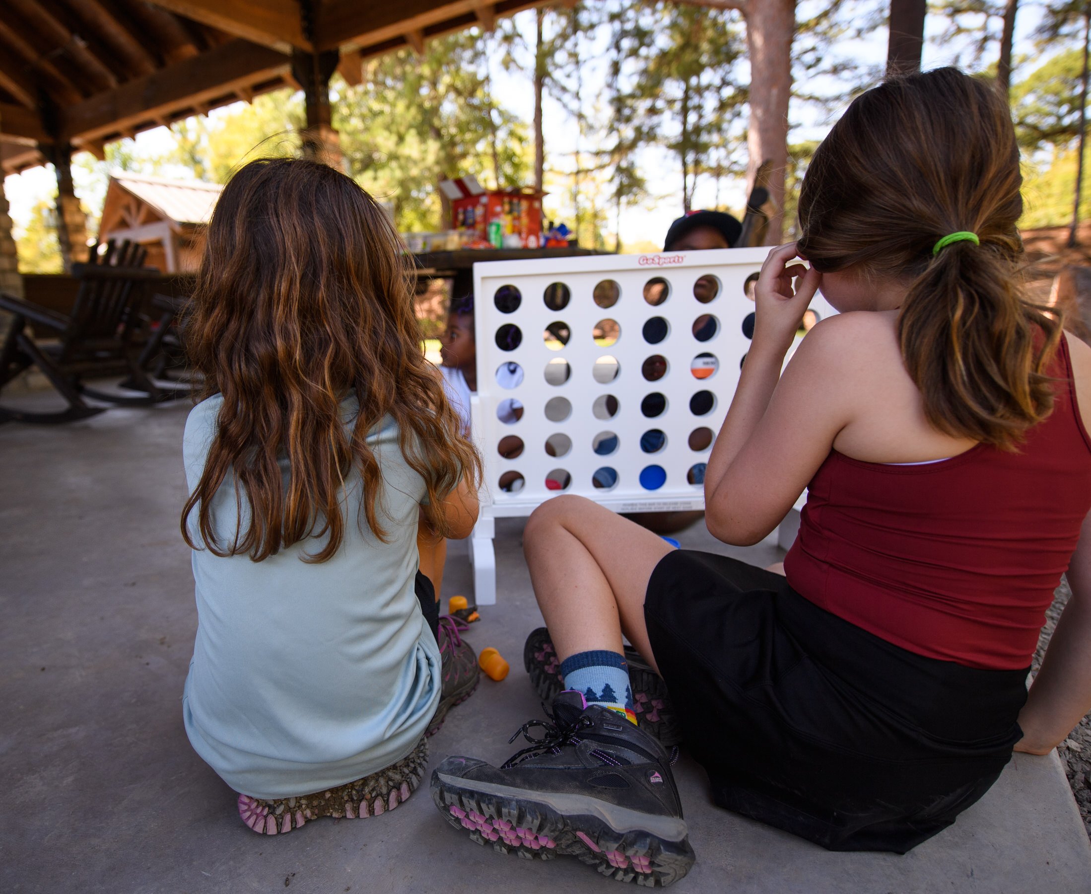 Kids playing together outside a family home
