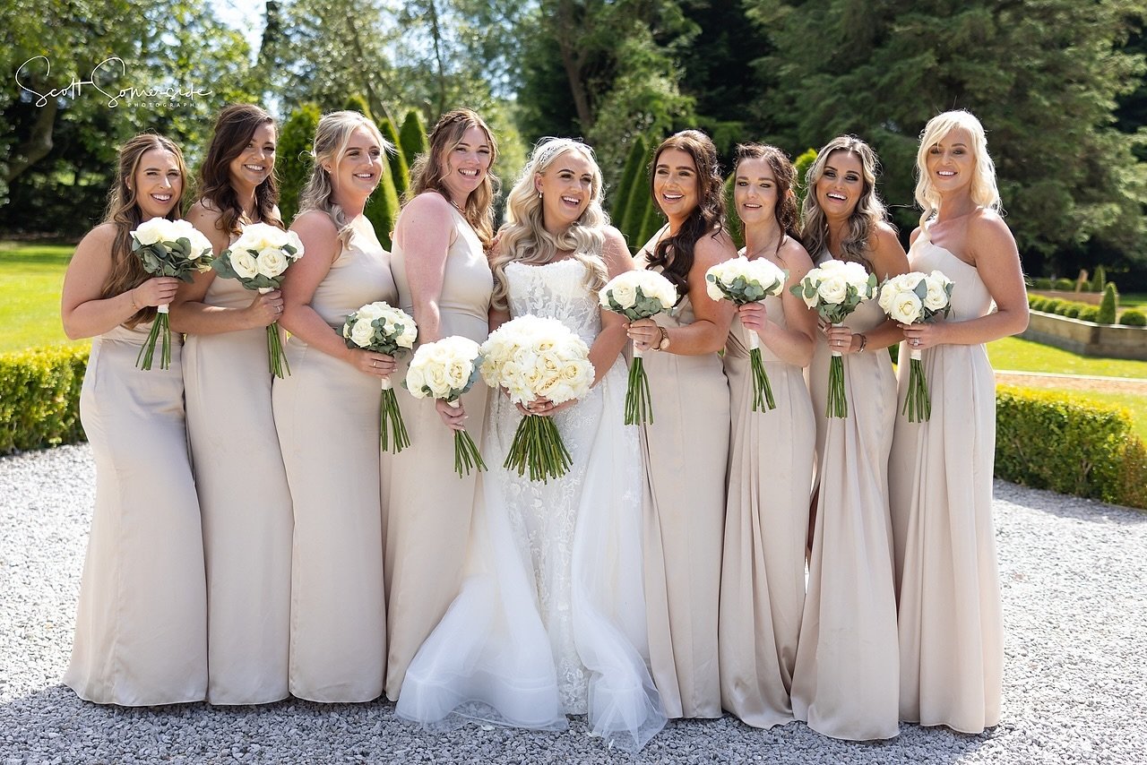 Obsessed with you @sskopek89 ✨ is there anything better than crisp whites with champagne? 🥂 

📸: @scottsomersidephotography 
⛪️: @riverbarnweddings 

Bridesmaids wearing: @dessygroup style - 6878 in Champagne 🍾 

#bridesmaiddresses #ribblevalleywe
