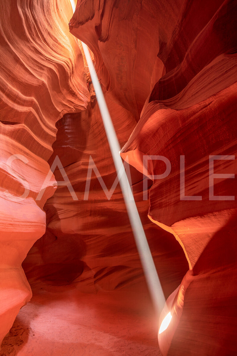 FOCUS The perfect single ray, visible for only a few minutes a day, captured on the floor of Upper Antelope Canyon