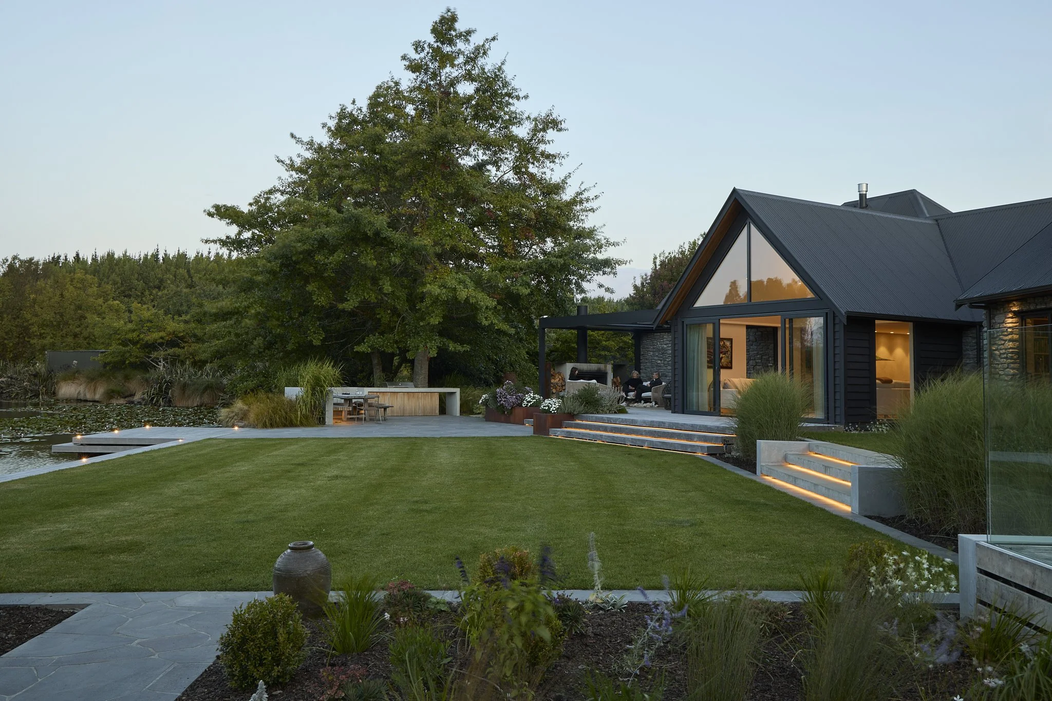 Garden terrace overlooking pond at Tai Tapu renovation