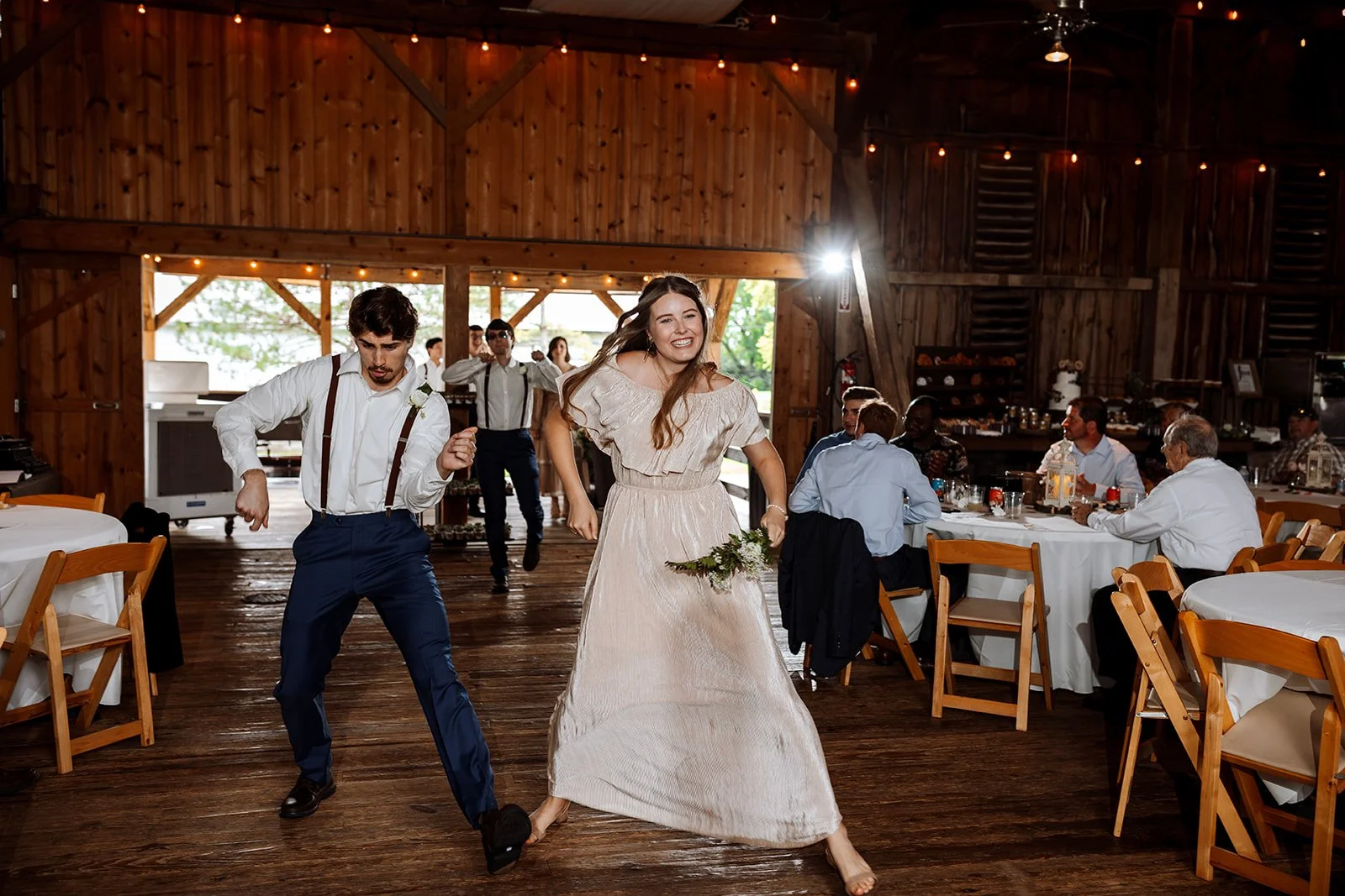 barn wedding venue- bridal party dance