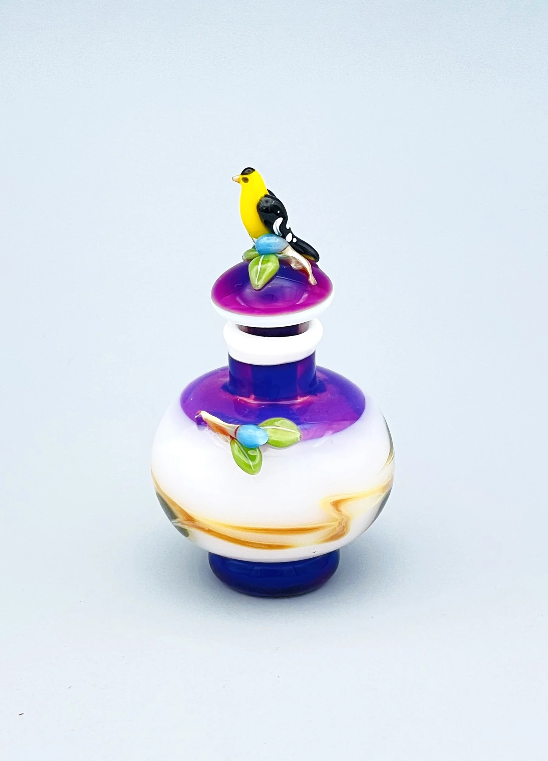 Goldfinch on Violet