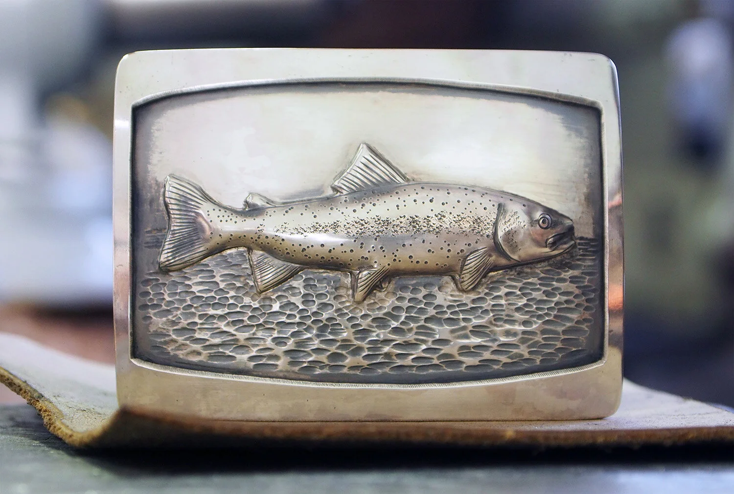 Sterling silver "window" buckle with sterling cutthroat trout. Buckle is 2.5" wide.