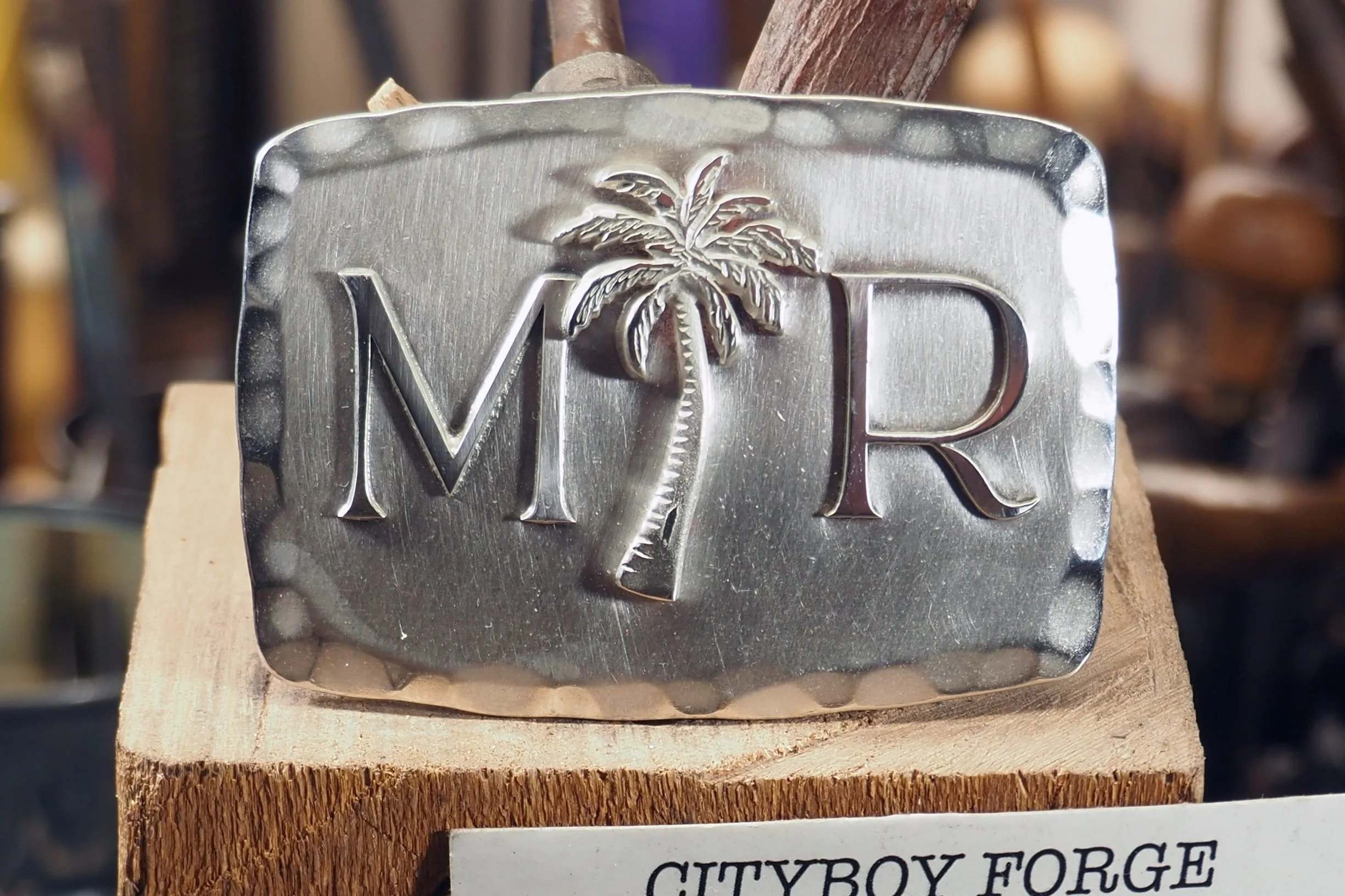 A set of very special birthday buckles. Silver plated steel with sterling design.