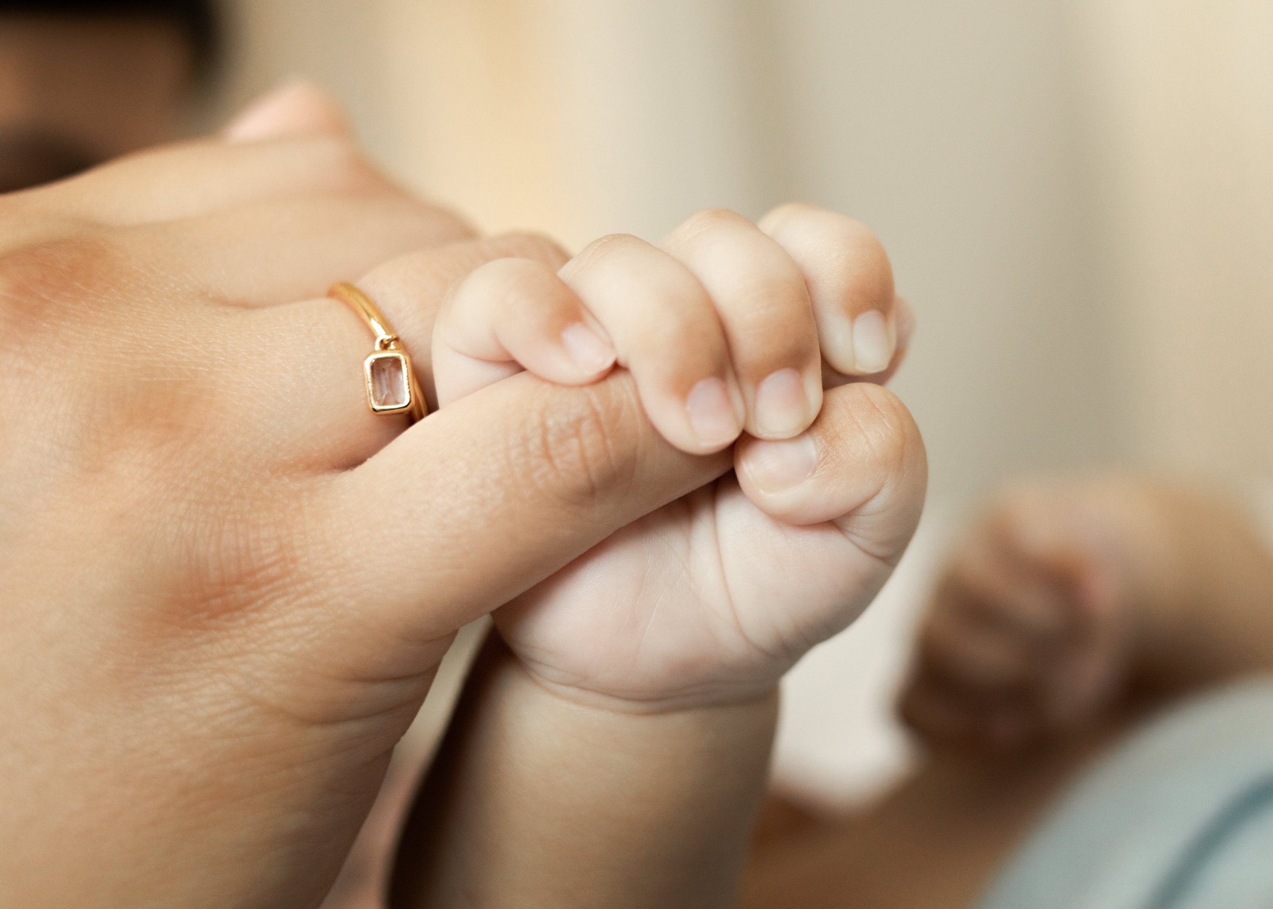 Newborn Holding Finger