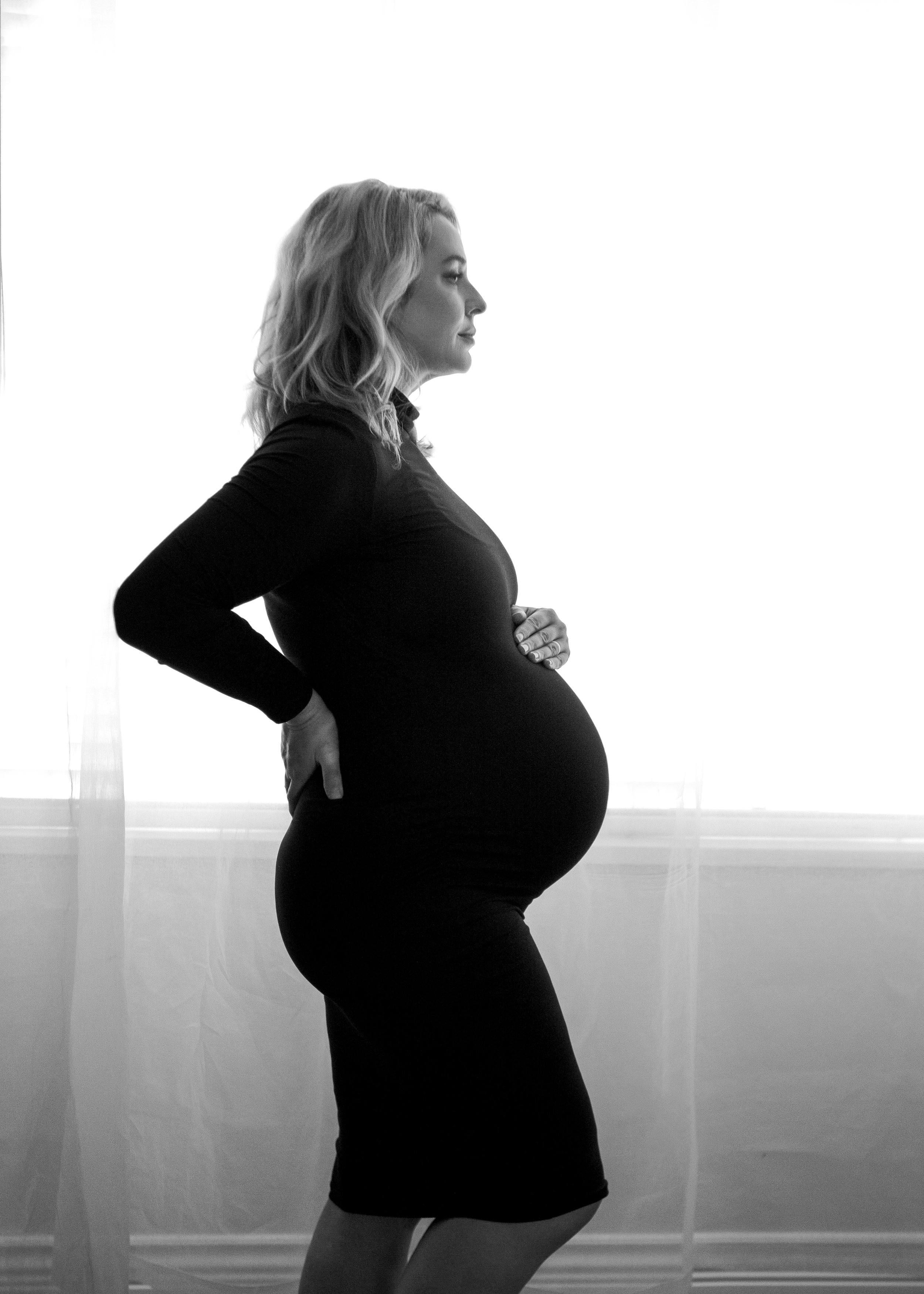 Maternity Silhouette by Window