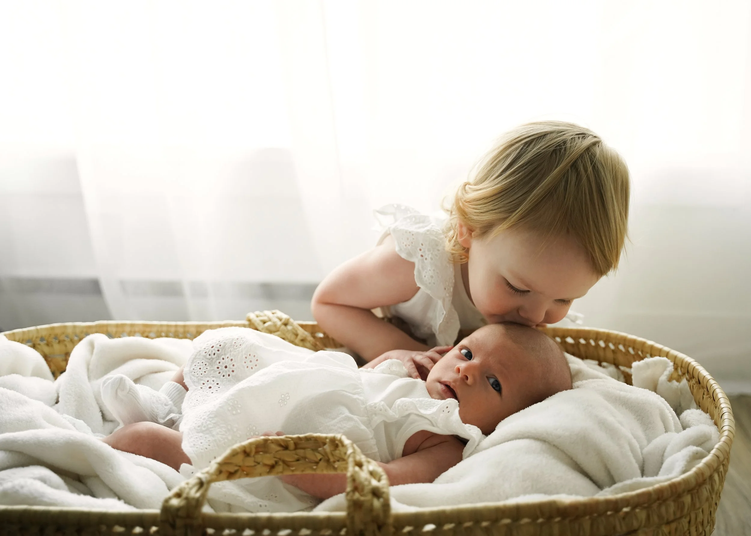 Sibling Kissing Newborn 