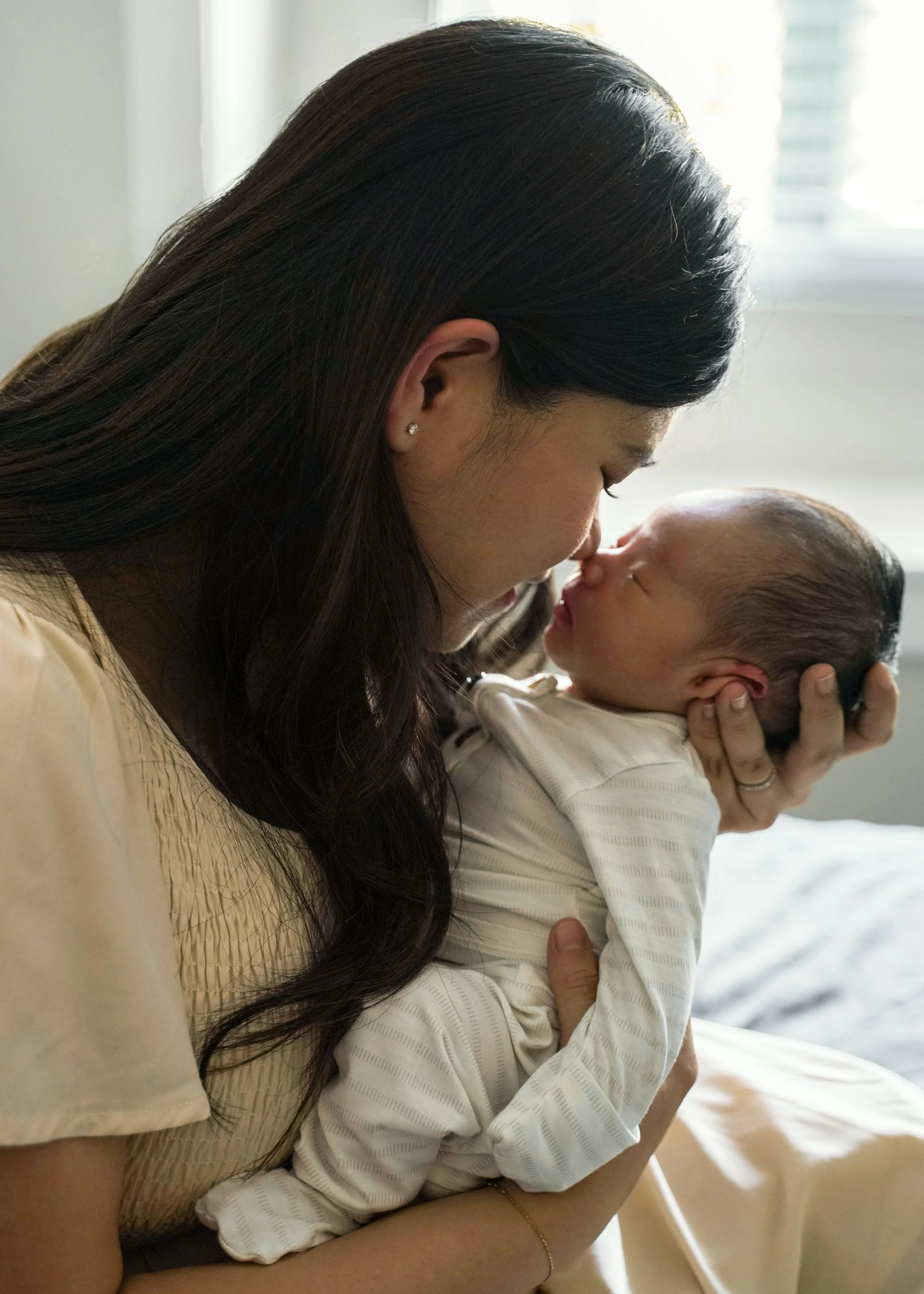Newborn and Mom Nose Kiss