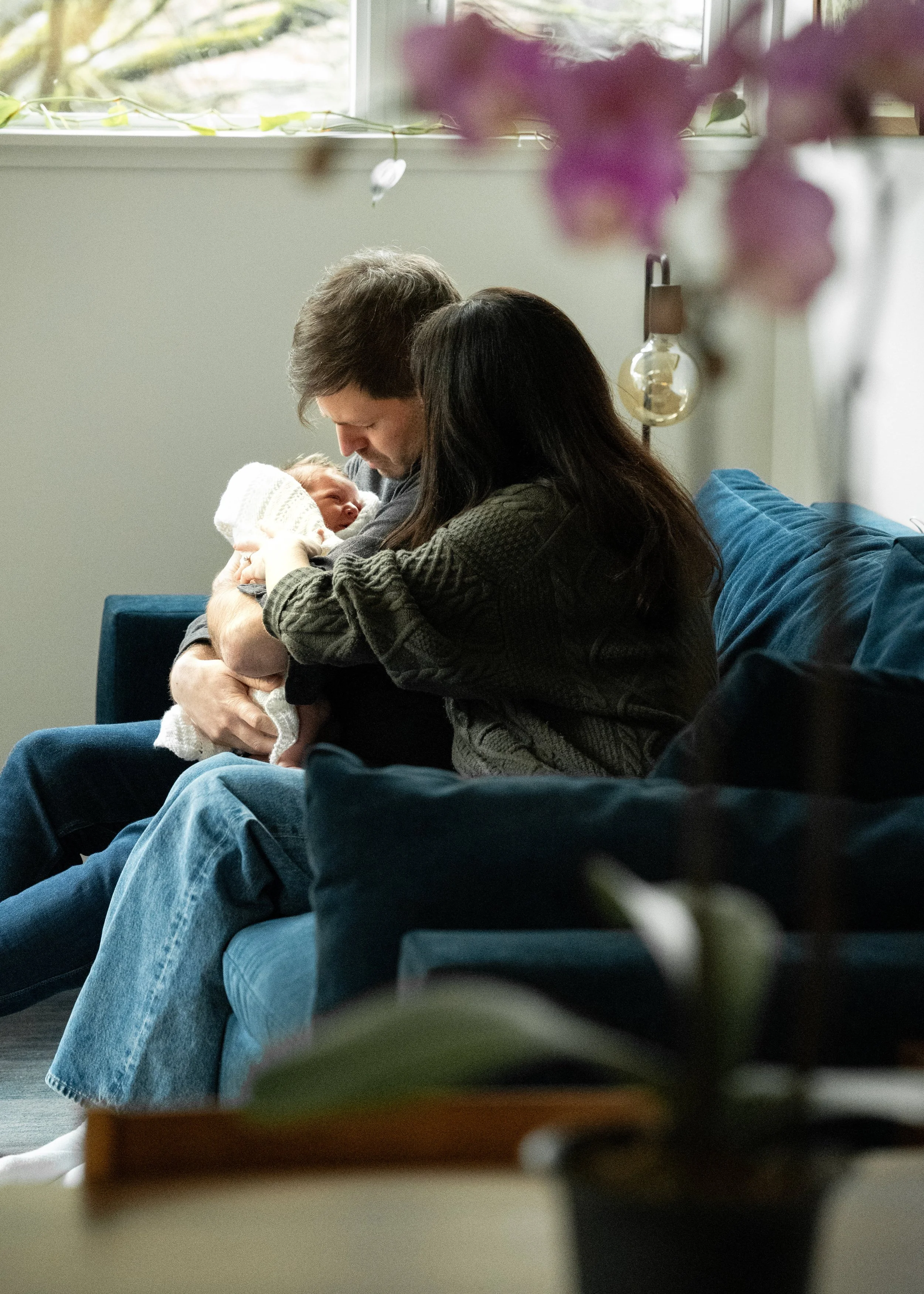 Candid newborn and parent photography at home