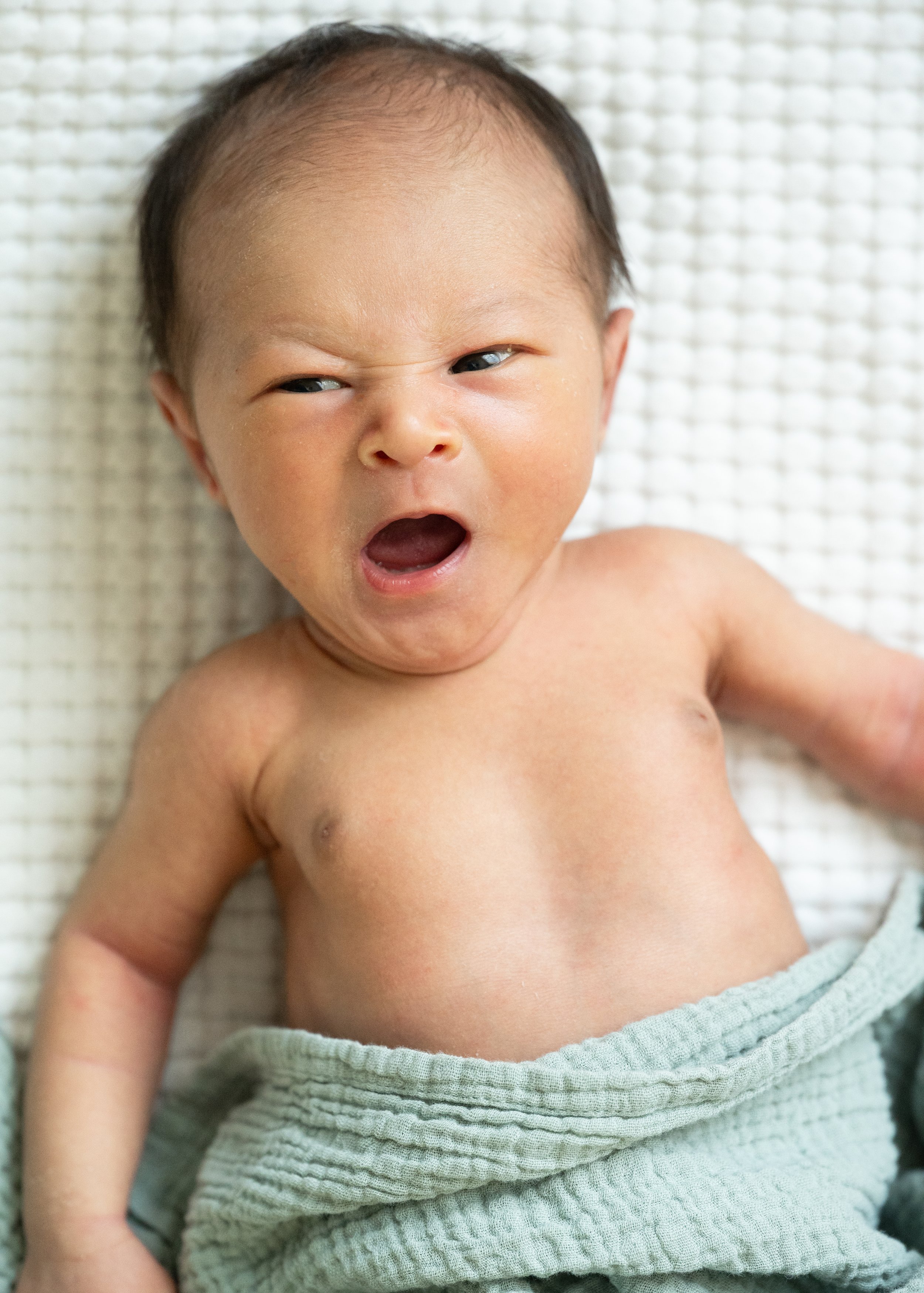 Yawning newborn photo