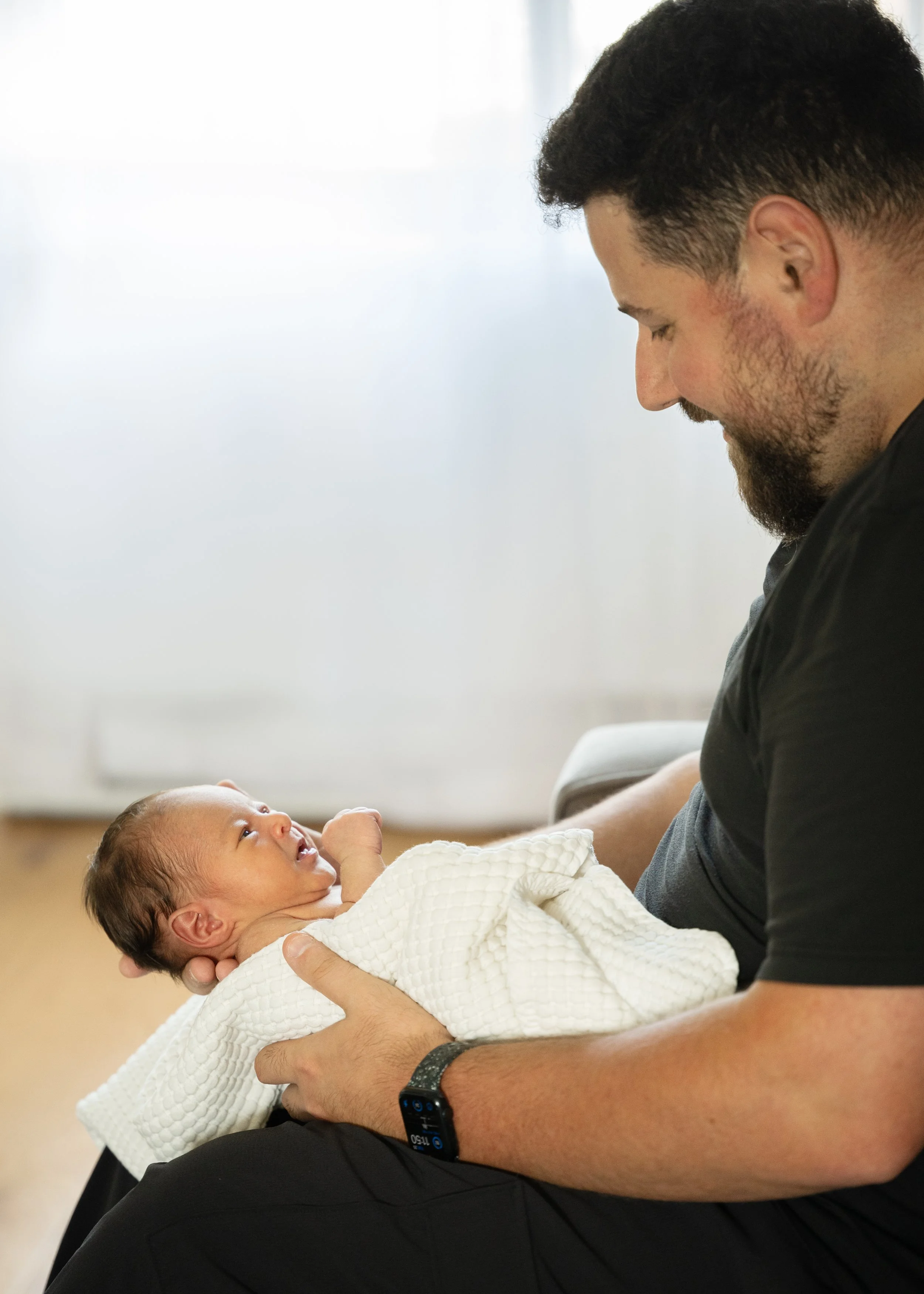 Dad and Newborn Baby