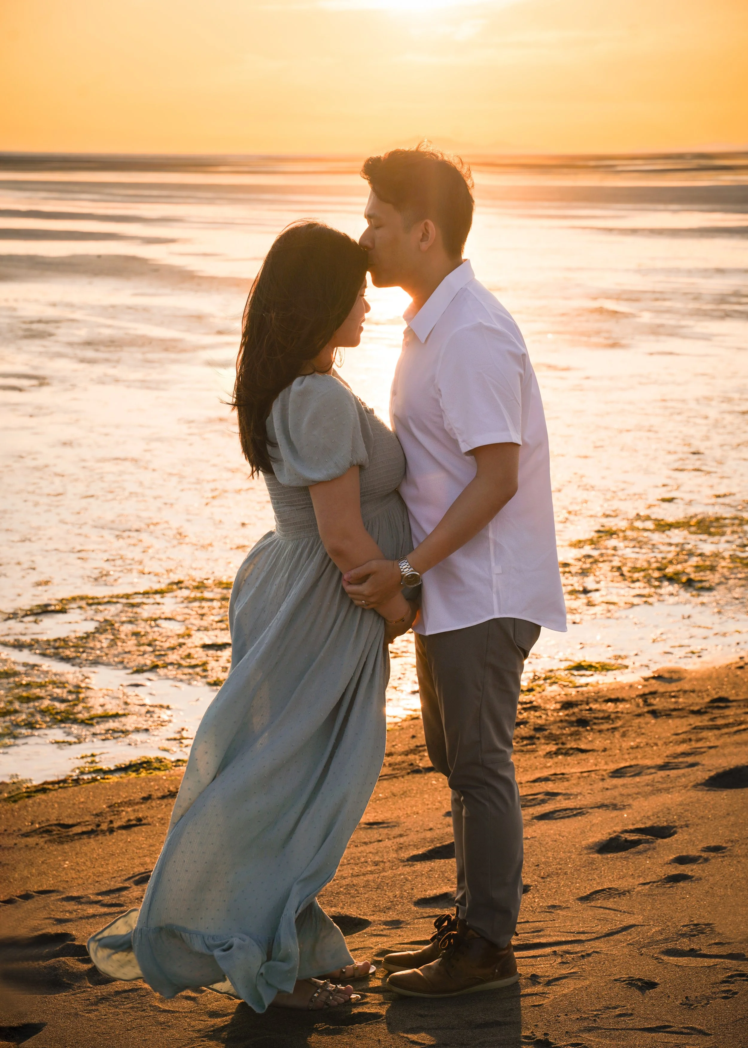 Sunset beach maternity session captured by Vancouver Newborn Photographers