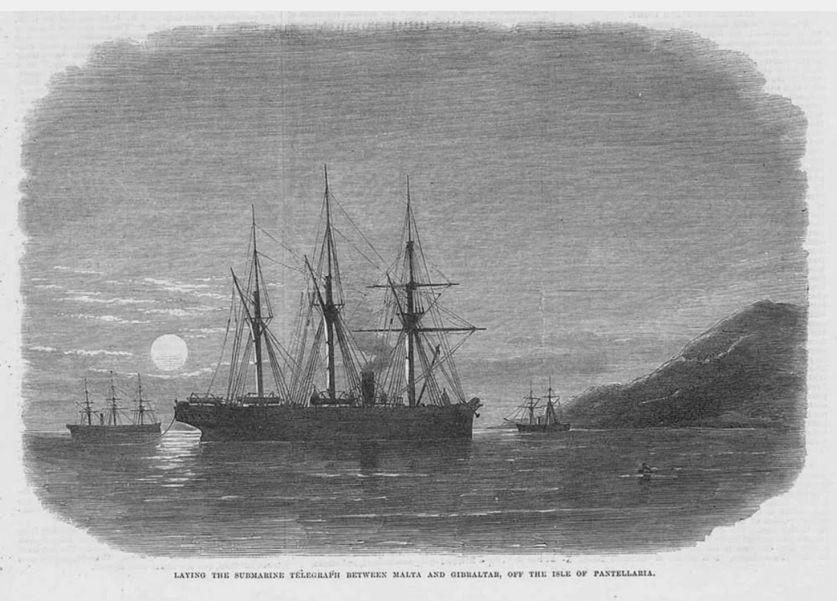 1870 &mdash; Malta / Gibraltar
Submarine Telegraph Cable

Nineteenth-century wood-engraved illustration depicting the laying of the submarine telegraph cable between Malta and Gibraltar, off the Isle of Pantelleria. Shown at dusk with cable-ships pos