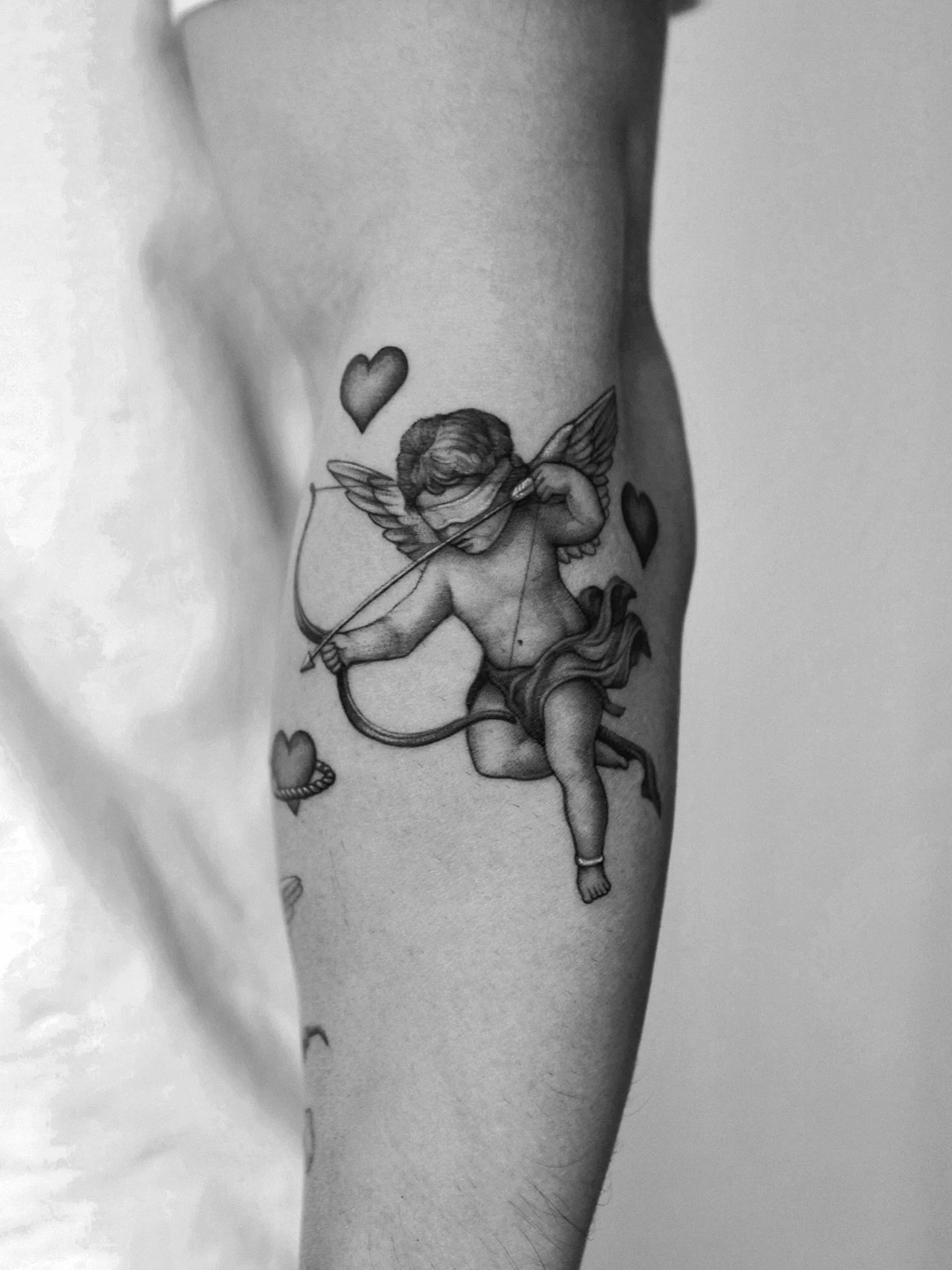 “ Unconditional Love “
Deeper Meanings behind the Tattoo 
Easily one of my favorite cherub pieces I’ve gotten to tattoo due to the meaning of the piece. The idea begins with unconditional love my client has for his children, repre