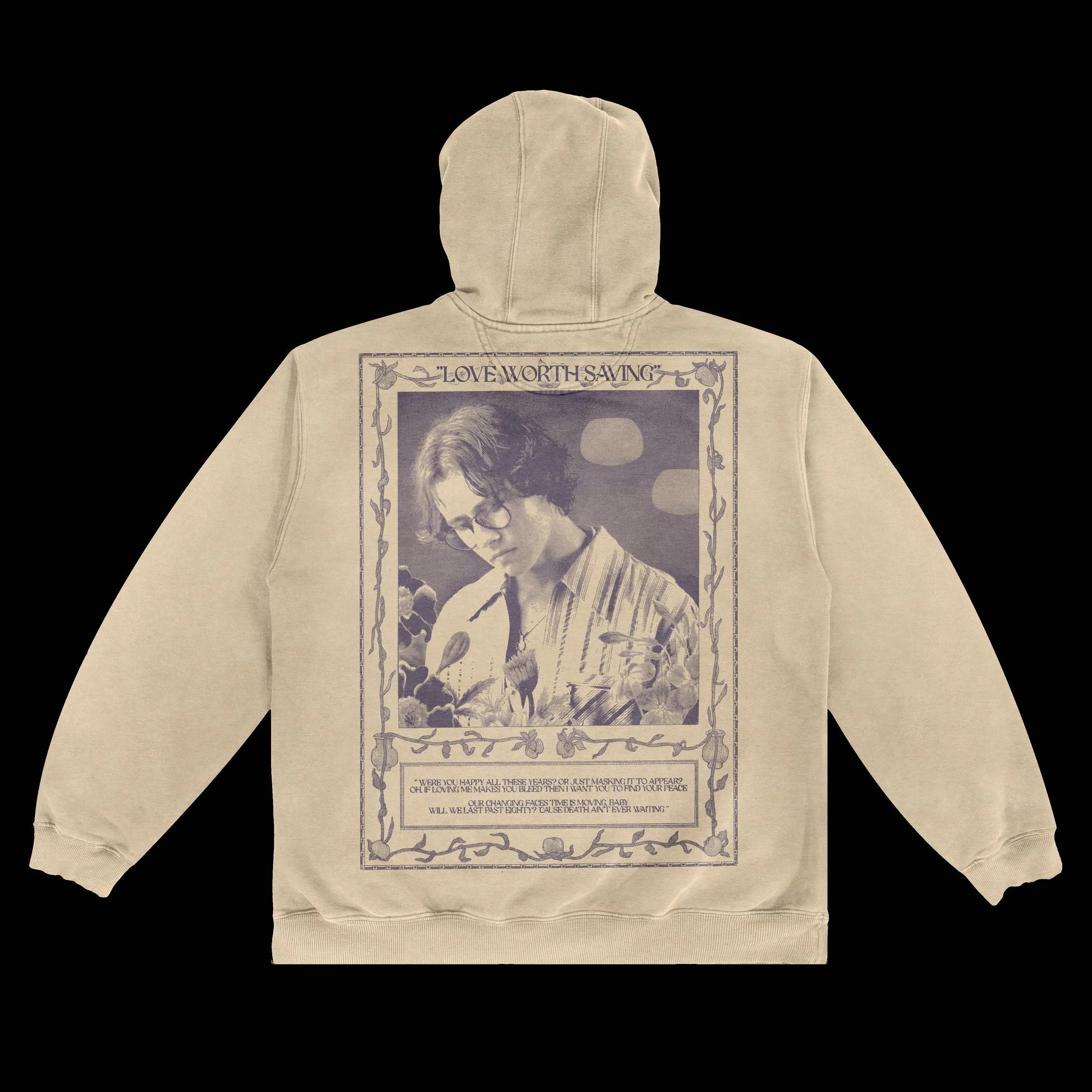 Beige hoodie featuring a black-and-white portrait of a young man with glasses, surrounded by floral decorative elements and text including 'LOVE WORTH SAVING' and a poem.