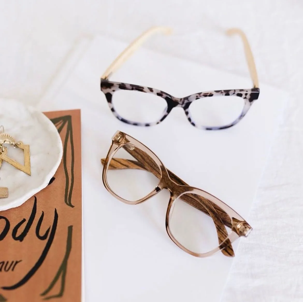 Weekend ready with our forever favourite Soek readers 📖🫶🏻 
Lila Grace in Ivory Tort and Champagne ~ available in different strengths.

#soek #soeksunglasses #soekreaders #readers #magnifyingglasses #readingglasses #weekendreading #bestsellers #lig