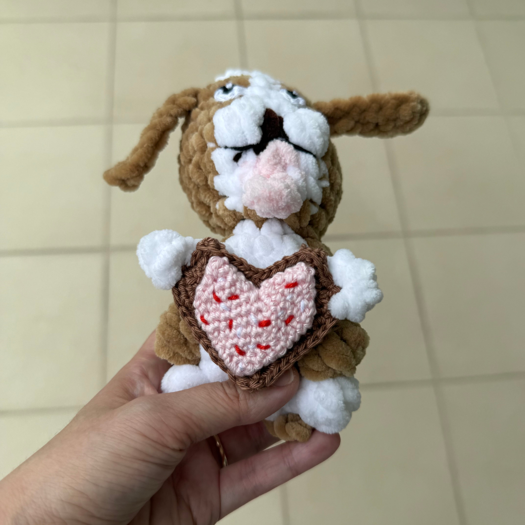 dog amigurumi with crochet heart biscuit.png
