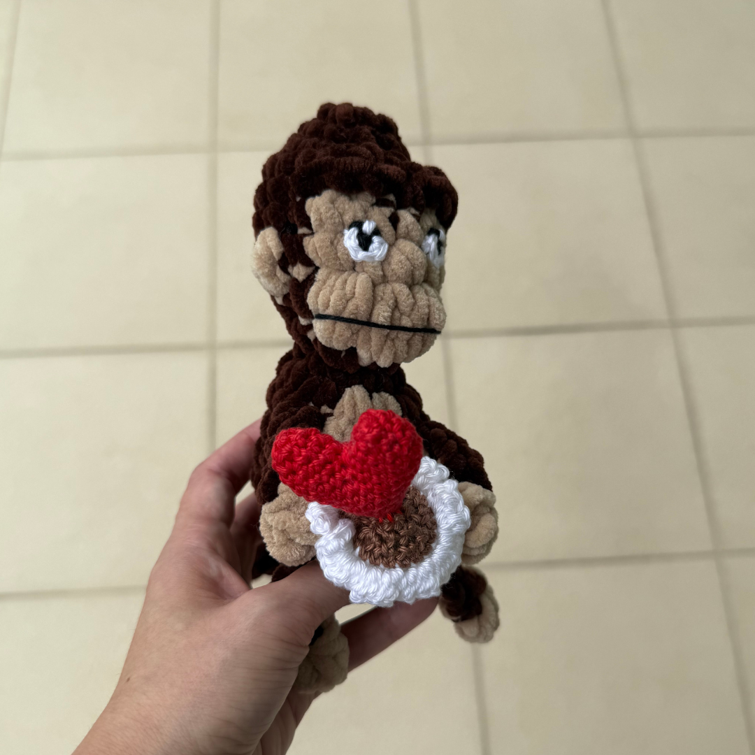 monkey amigurumi with heart cactus.png