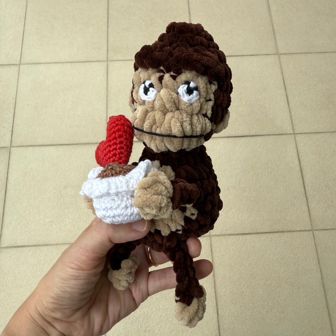 crochet monkey with potted heart.png