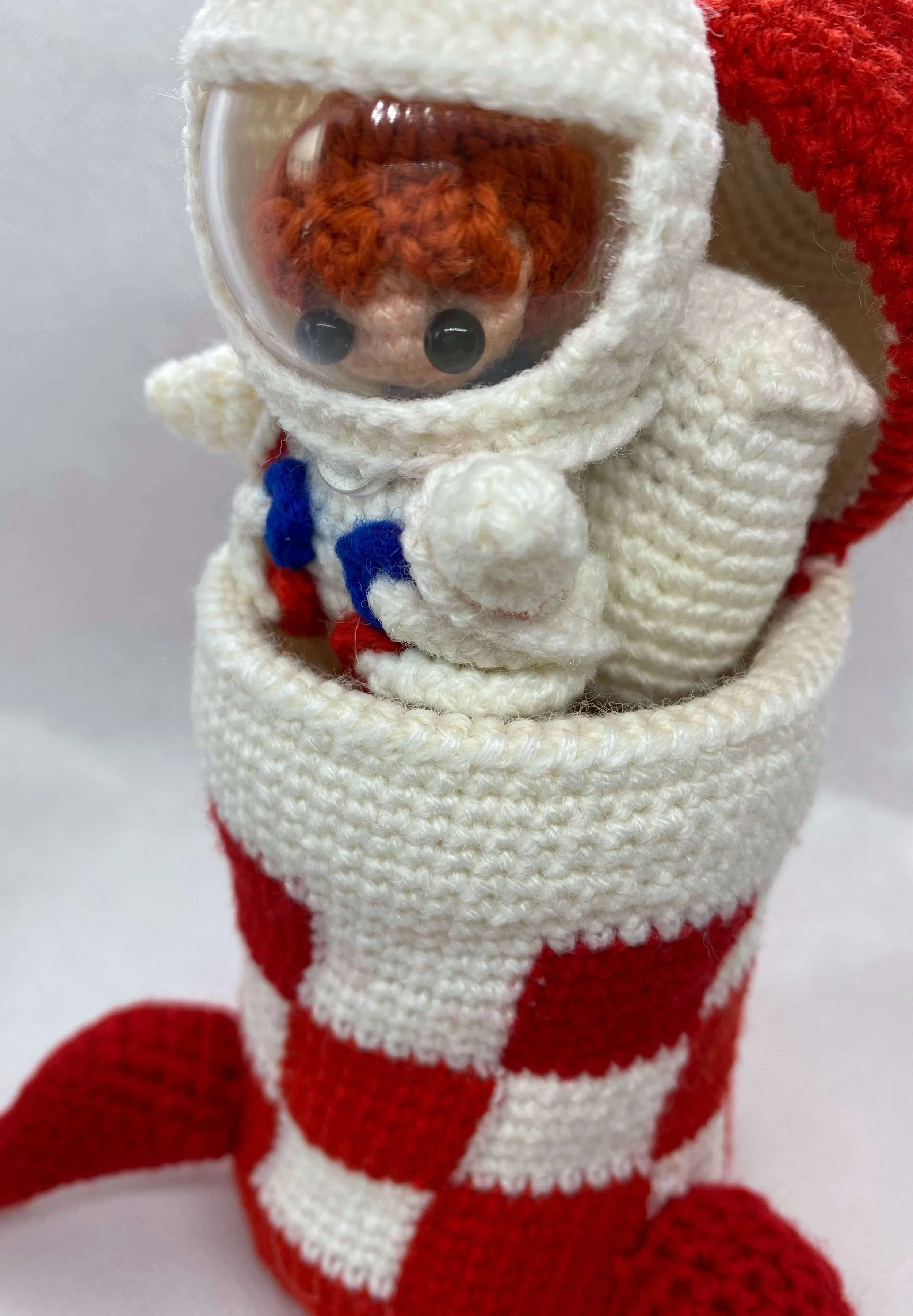 crochet astronaut in rocket.jpg