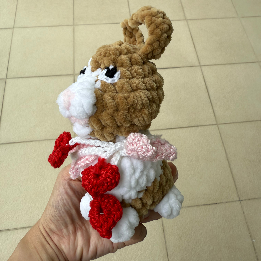crochet bunny with heart garland.png