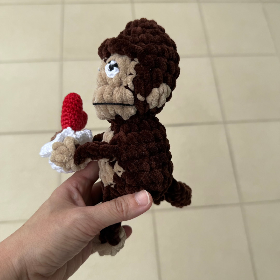 monkey crochet with heart pot.png