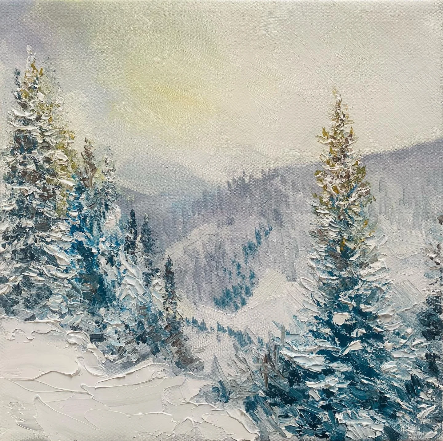 Here, at the top, one can truly appreciate the grandeur of nature, a fleeting moment suspended in time amidst the vastness of the world. The atmosphere is invigorating, each breath taken sharp and clear, a reminder of the altitude and the chill that 