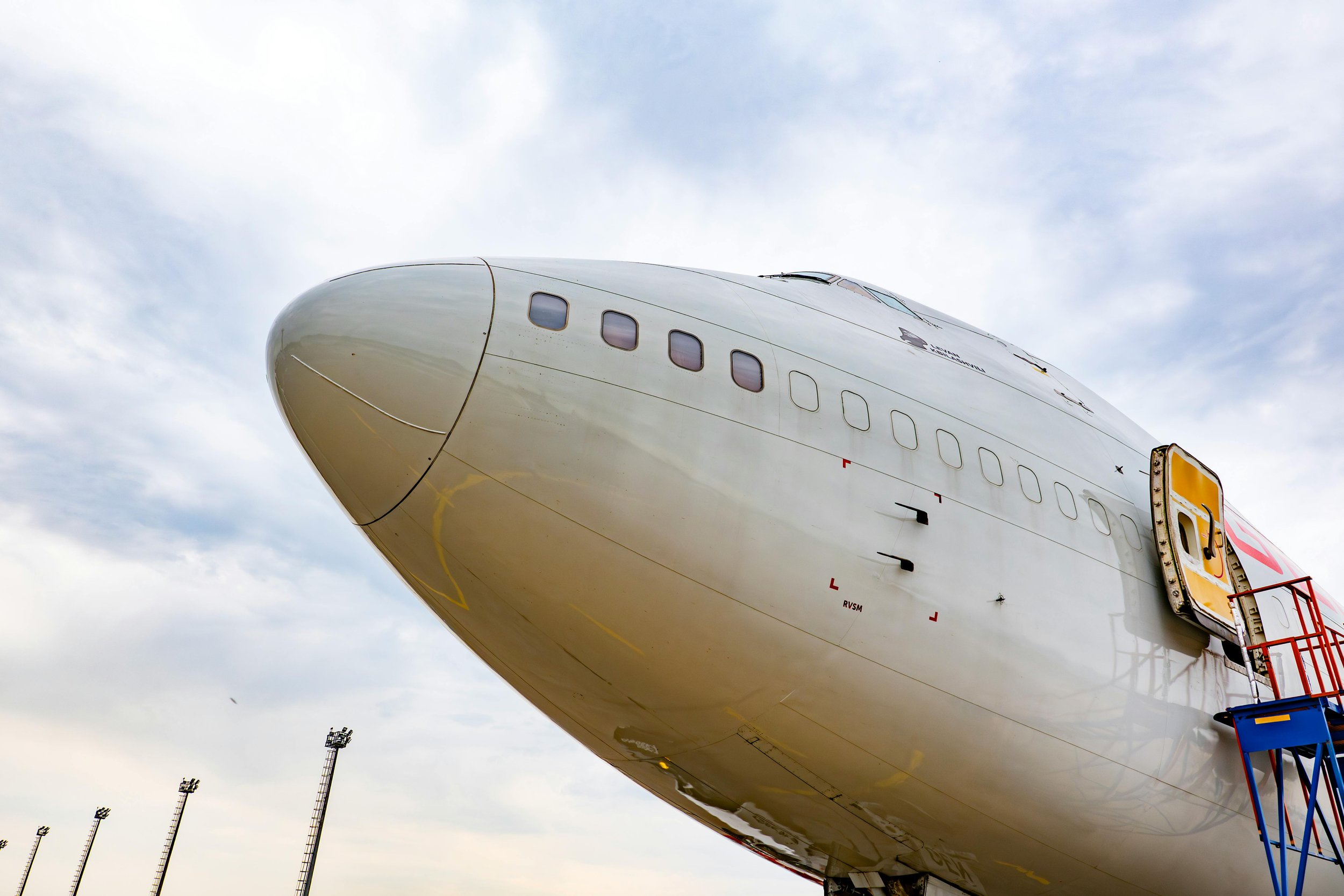 Commercial aircraft undergoing ground inspection — airworthiness data validation ensures maintenance records remain accurate and traceable throughout the aircraft lifecycle