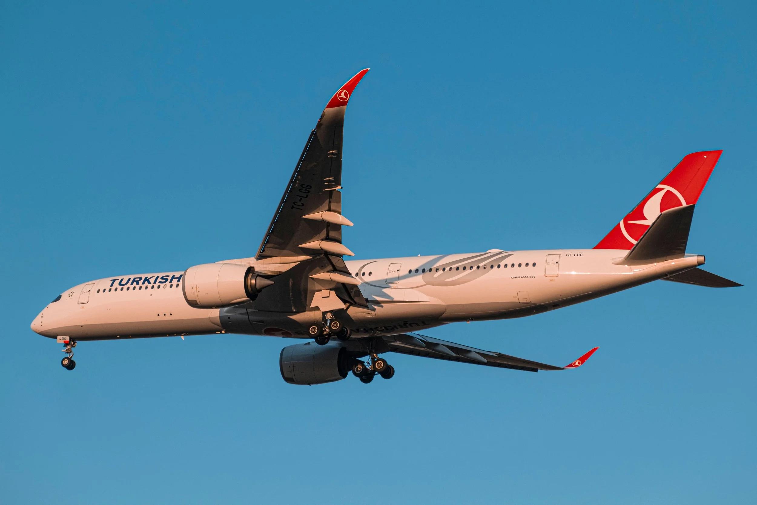 Turkish Airlines widebody aircraft on approach with landing gear extended.
