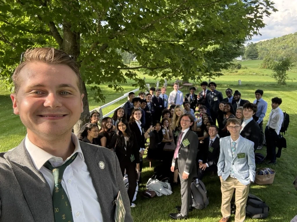 Coolidge Senators Program Manager Jacob McNeill with students at the Notch