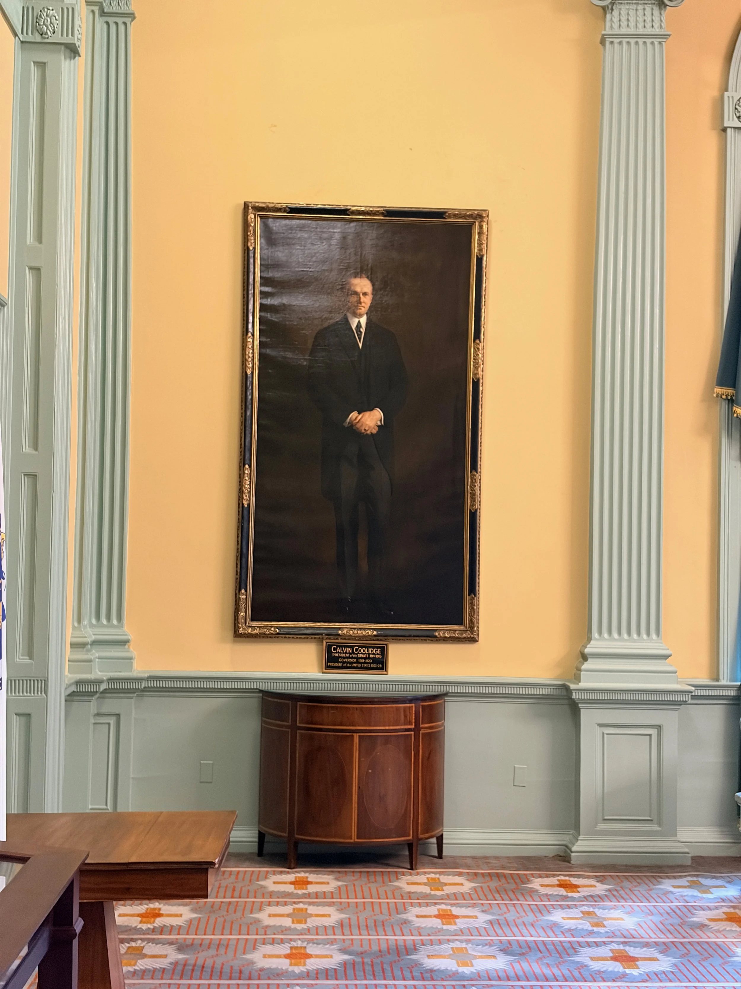 A portrait of Calvin Coolidge in the Massachusetts State House
