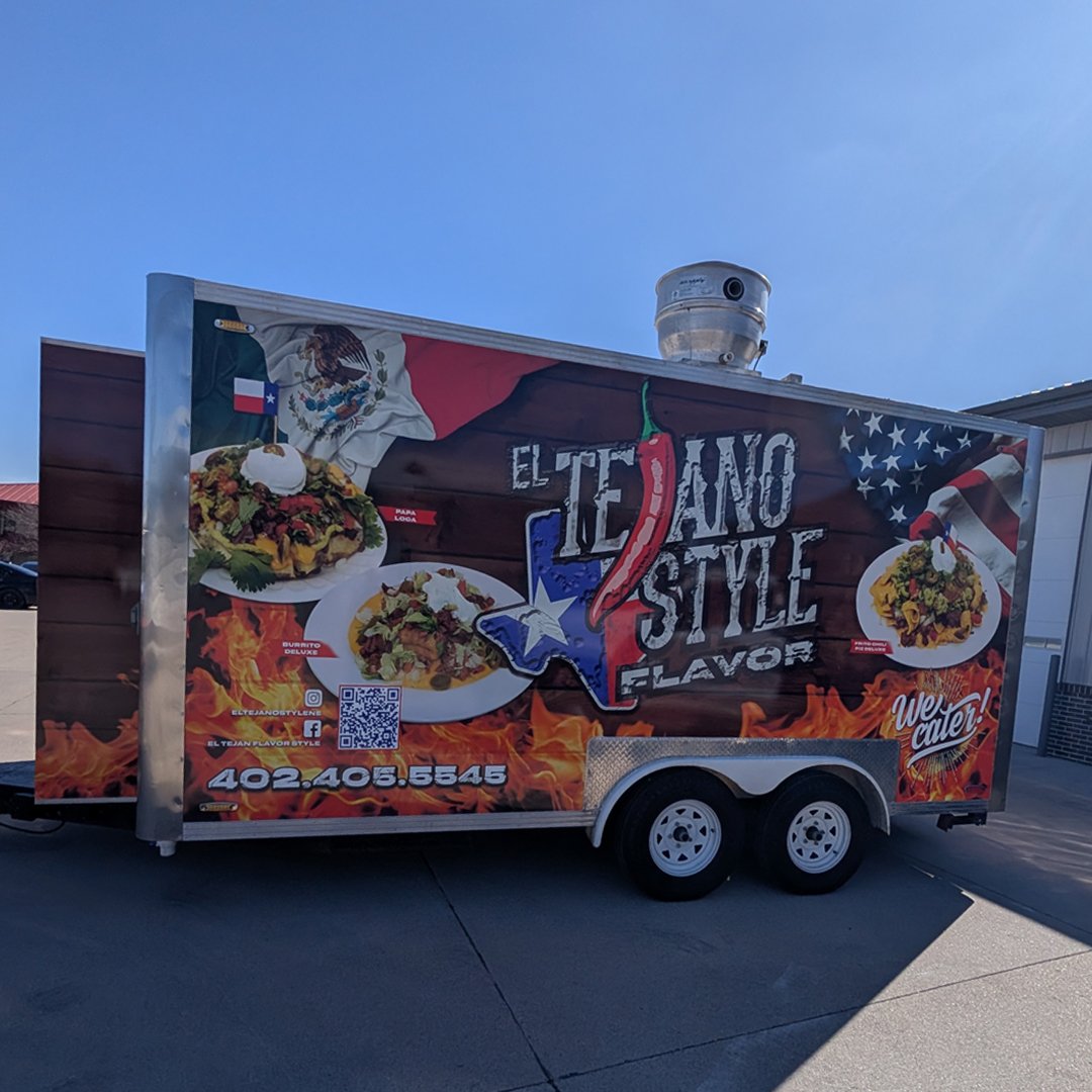 Passenger side displaying logo and food items with high resolution photographs