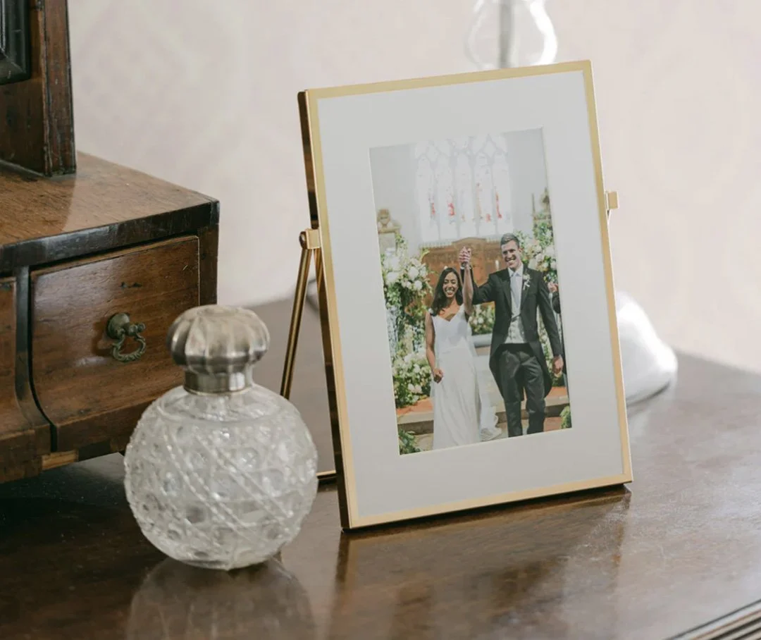 gold easel on table Rogers.jpg