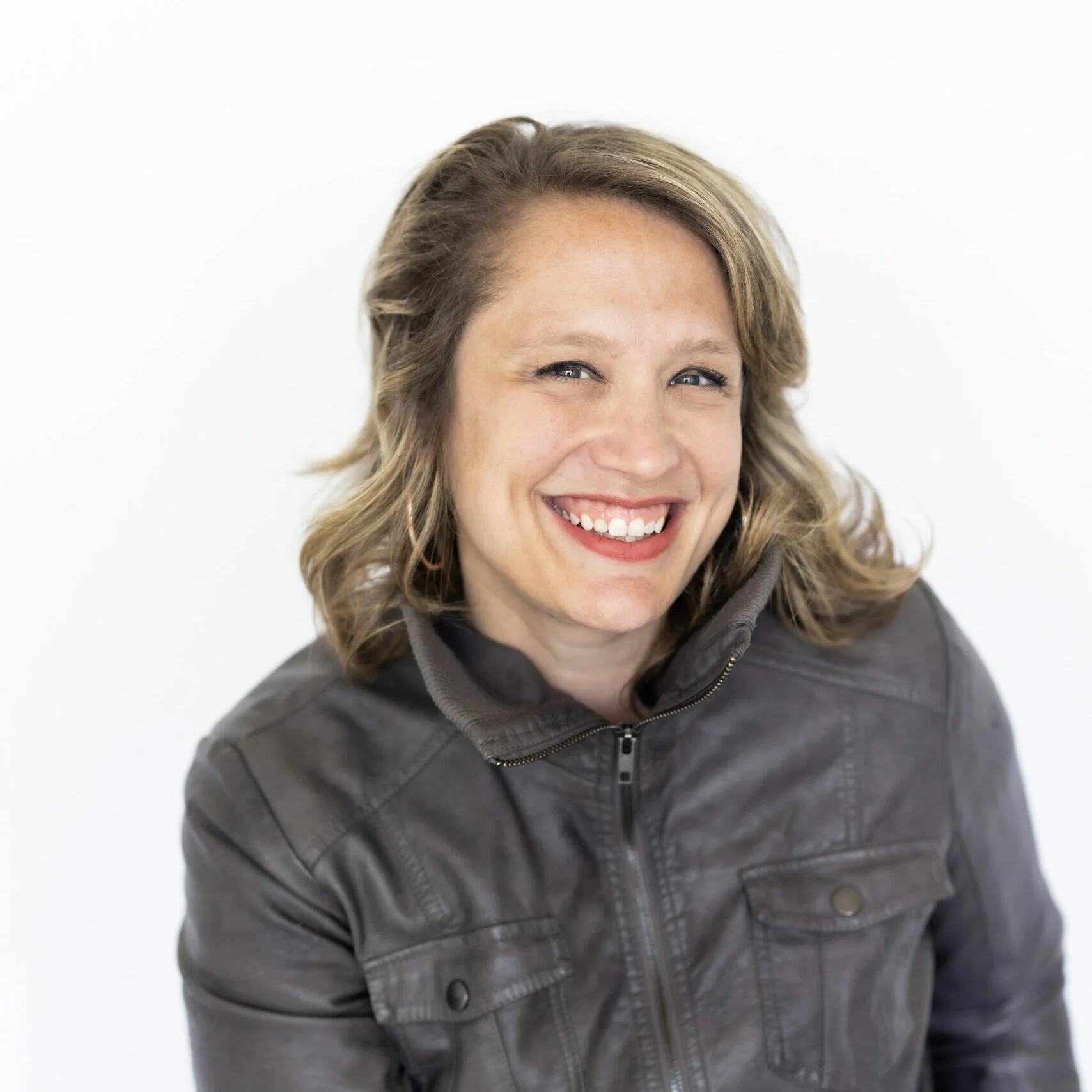 Women and non-binary storytellers performing live on stage at a Generation Women showcase in New York City