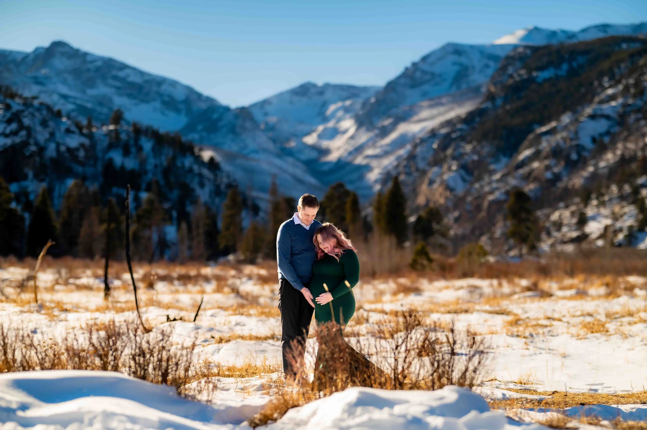 Maternity session in Rocky Mountain National Park on a snowy January day