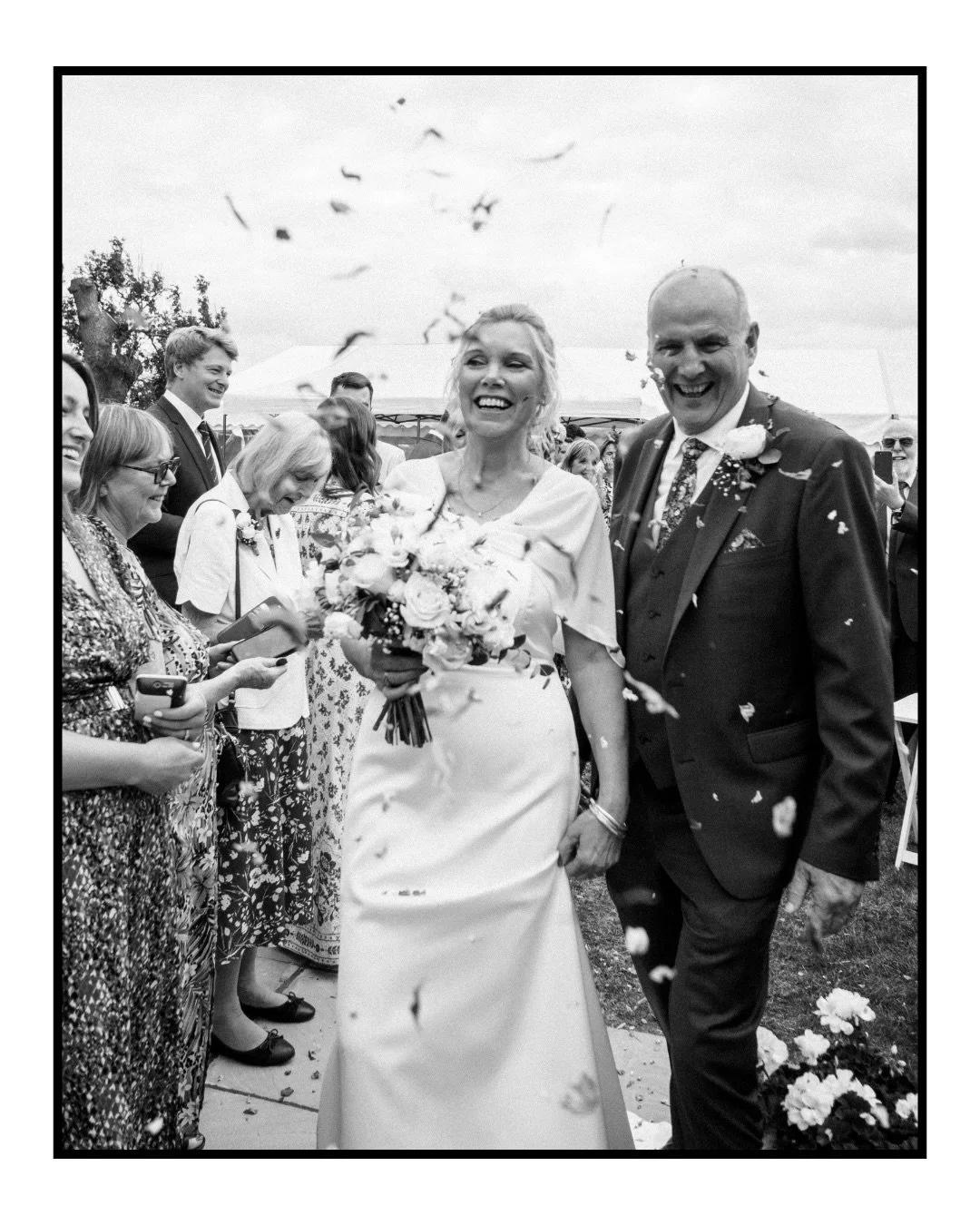 A wedding exactly as it should be. Personal, intimate, and completely their own.

Set in their back garden with the Vale of Belvoir stretching out beyond, every moment unfolded naturally. No posing, no pressure, just real memories as they happened.

