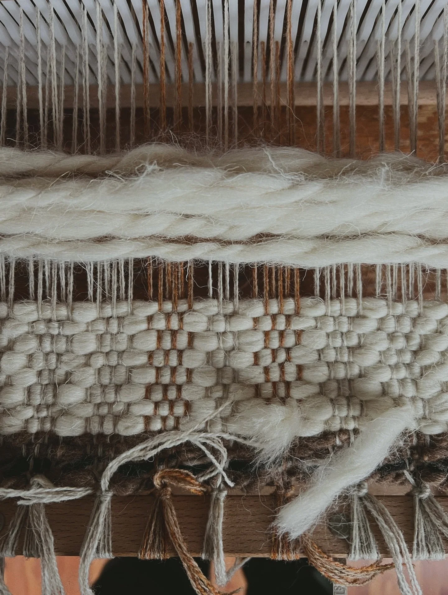 Just started, just finished. A hand spun table runner on the loom.