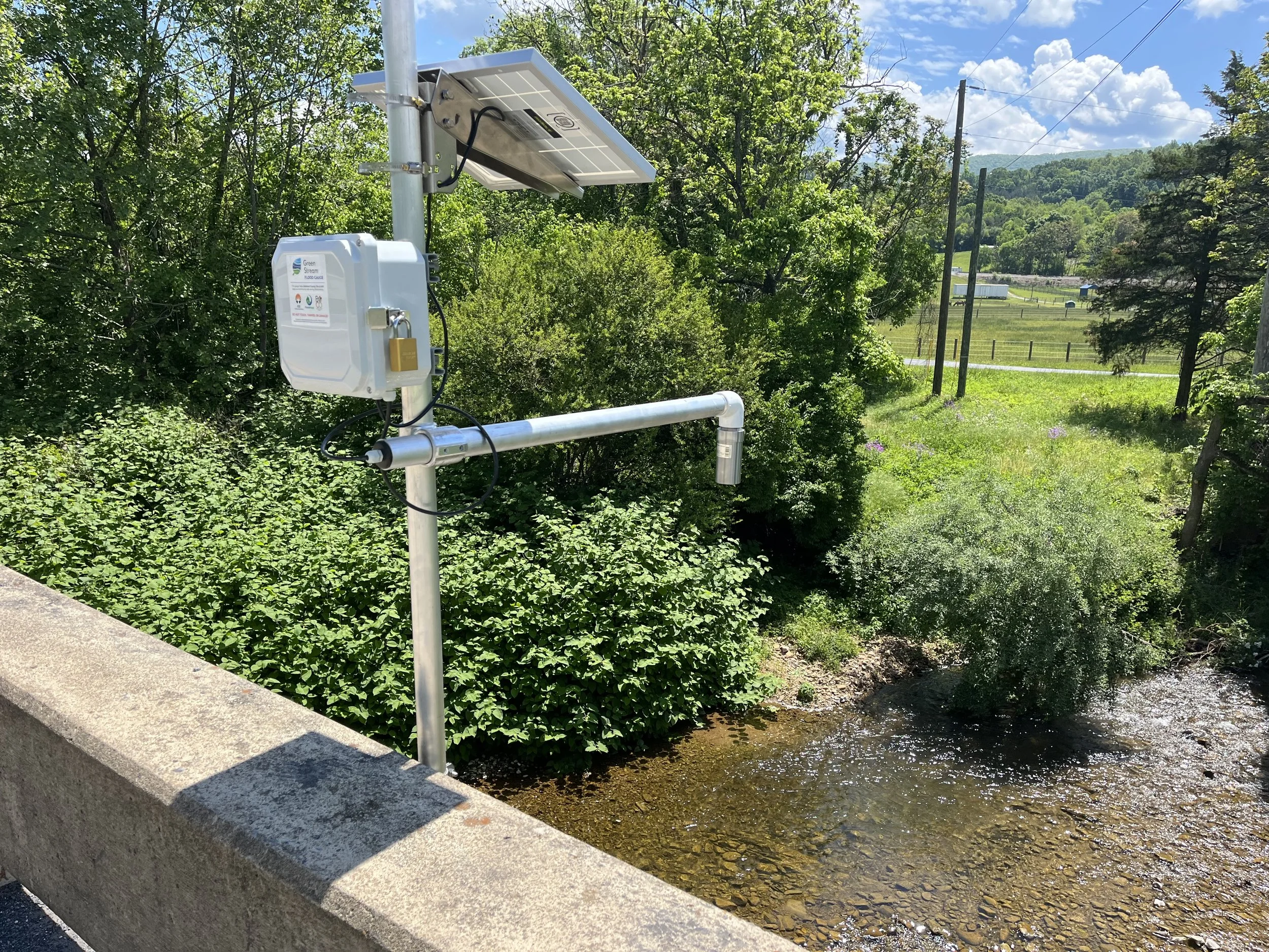 A water level sensor monitors a frequently flooded mountain stream.