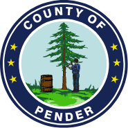 Seal of Pender County showing a pine tree, a barrel, and a man standing on green grass with a blue sky background