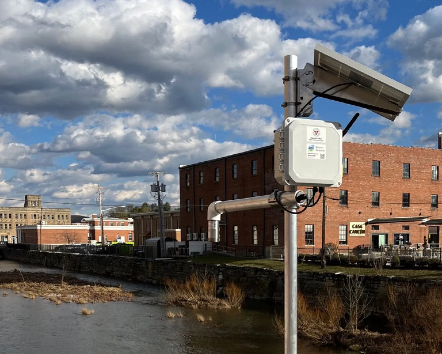 A water level sensor monitors a frequently flooded river in a mountain town.