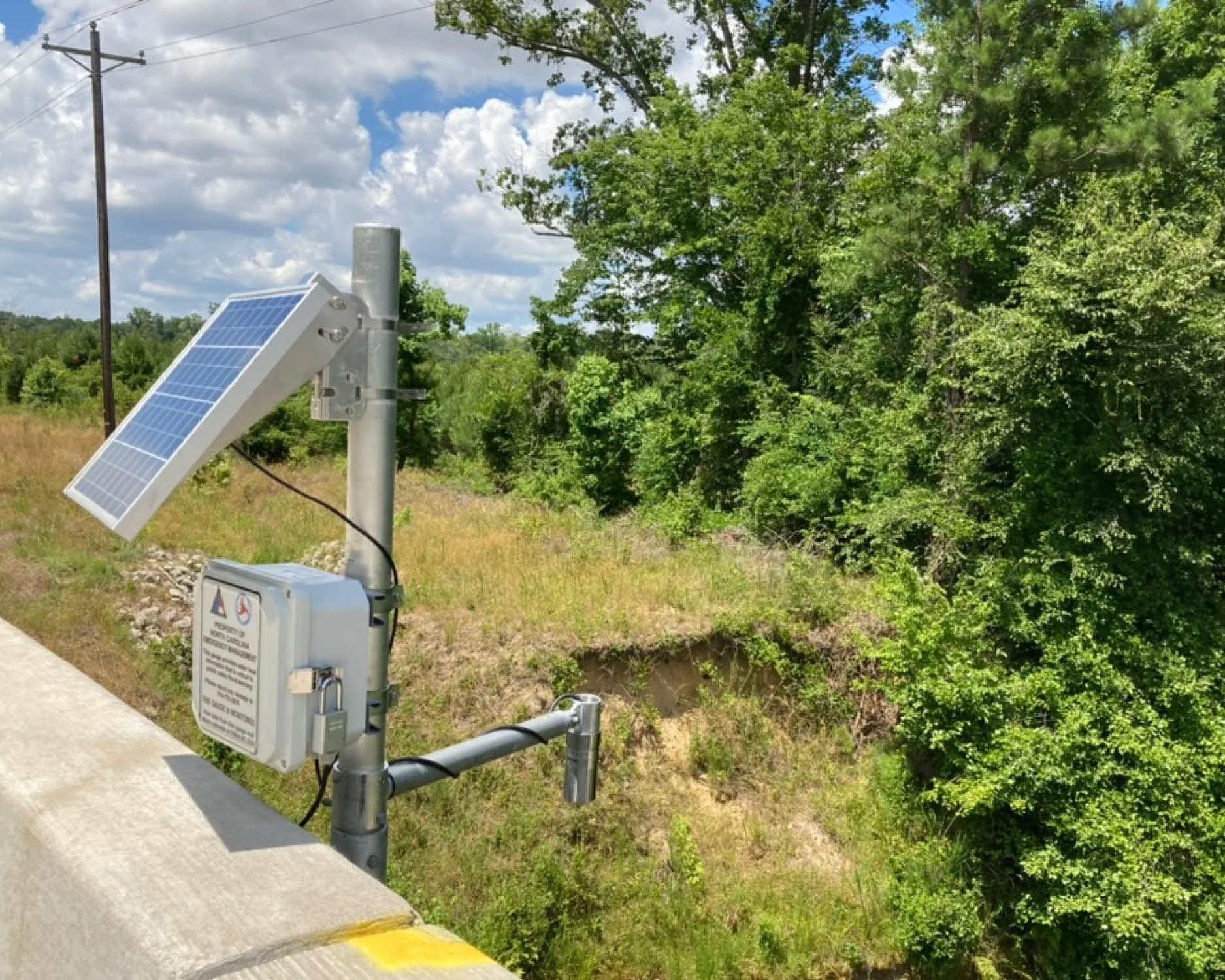 A water level sensor monitors a frequently flooded mountain stream.