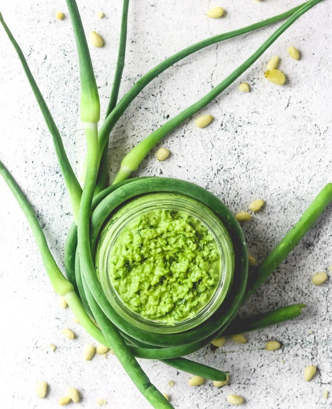 Garlic Scape Pesto is the perfect light and delicious addition to add to your next summer meal. ⁠
It is high in antioxidants as well as gluten free, vegan and raw! ⁠
🌿⁠
Have you tried cooking with garlic scapes?⁠
.⁠
.⁠
.⁠
Recipe link in bio⬆️⁠
.⁠
#g