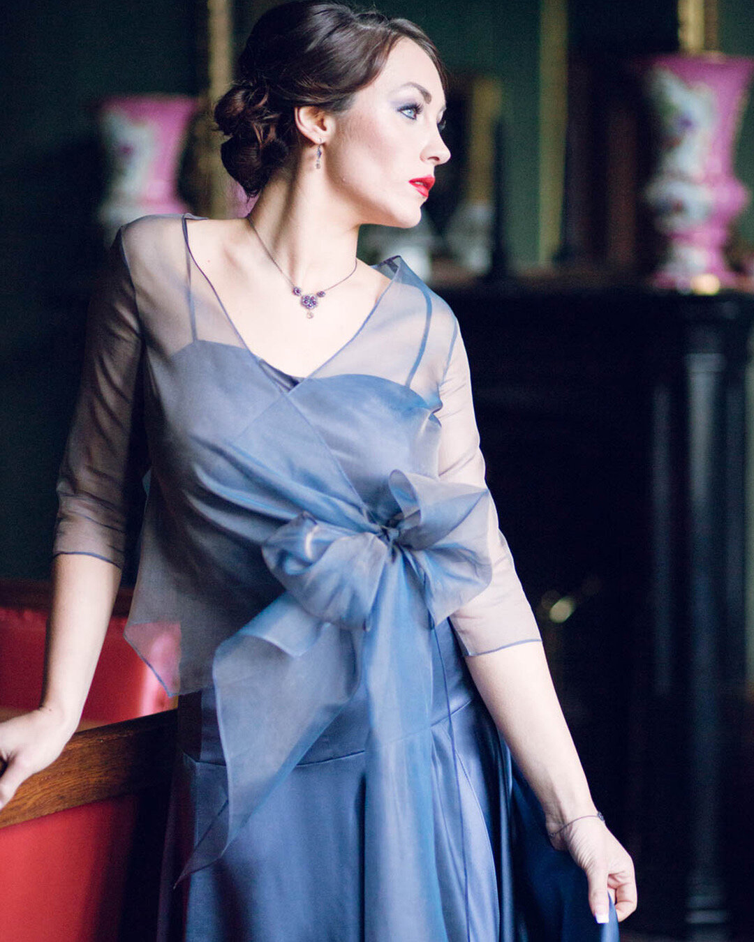 A model wearing the wraparound silk organza top made in the workshop