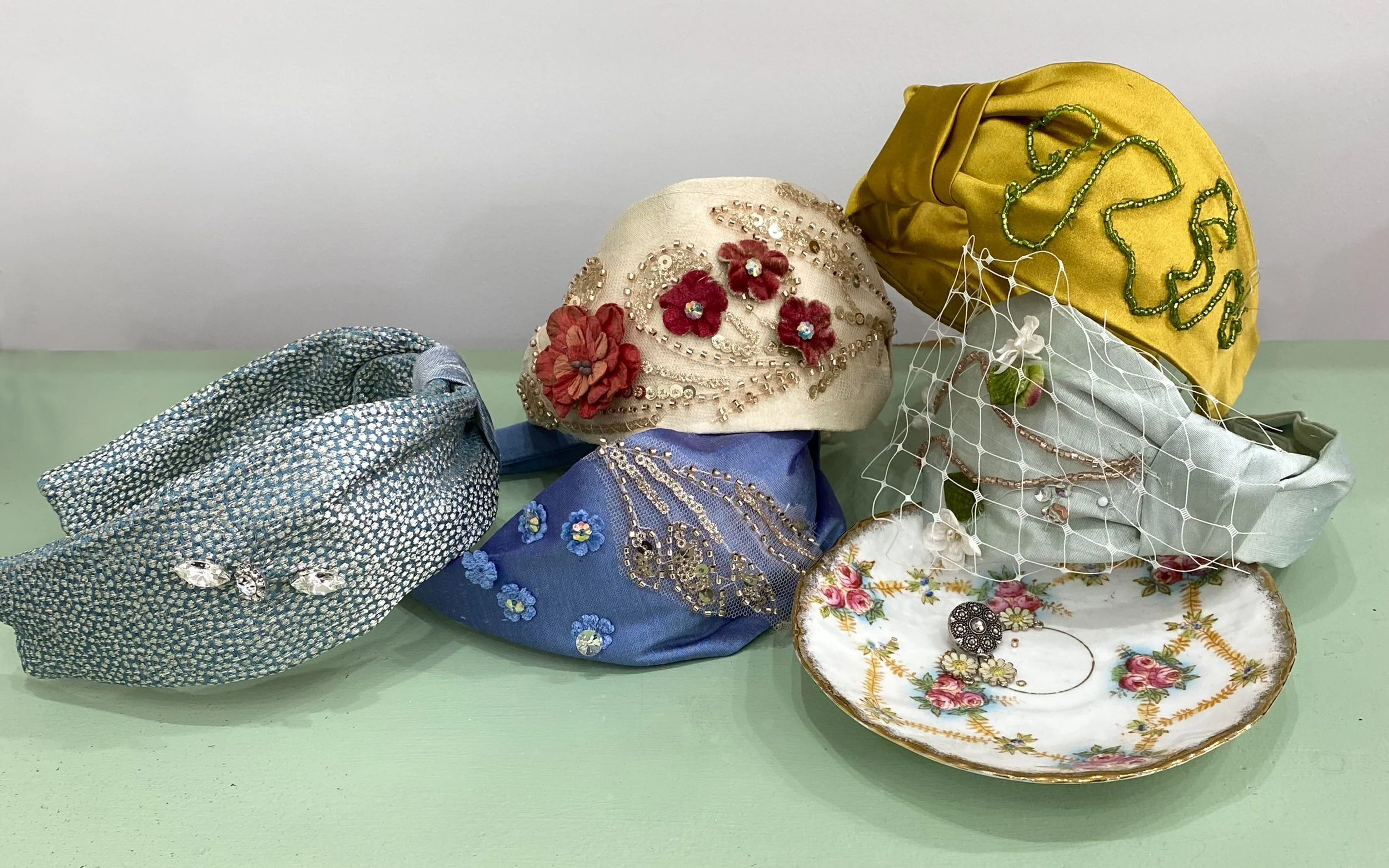 A beautiful collection of handmade headbands featuring vintage beads, velvet flowers, lace appliqué, millinery net and carefully stitched details.