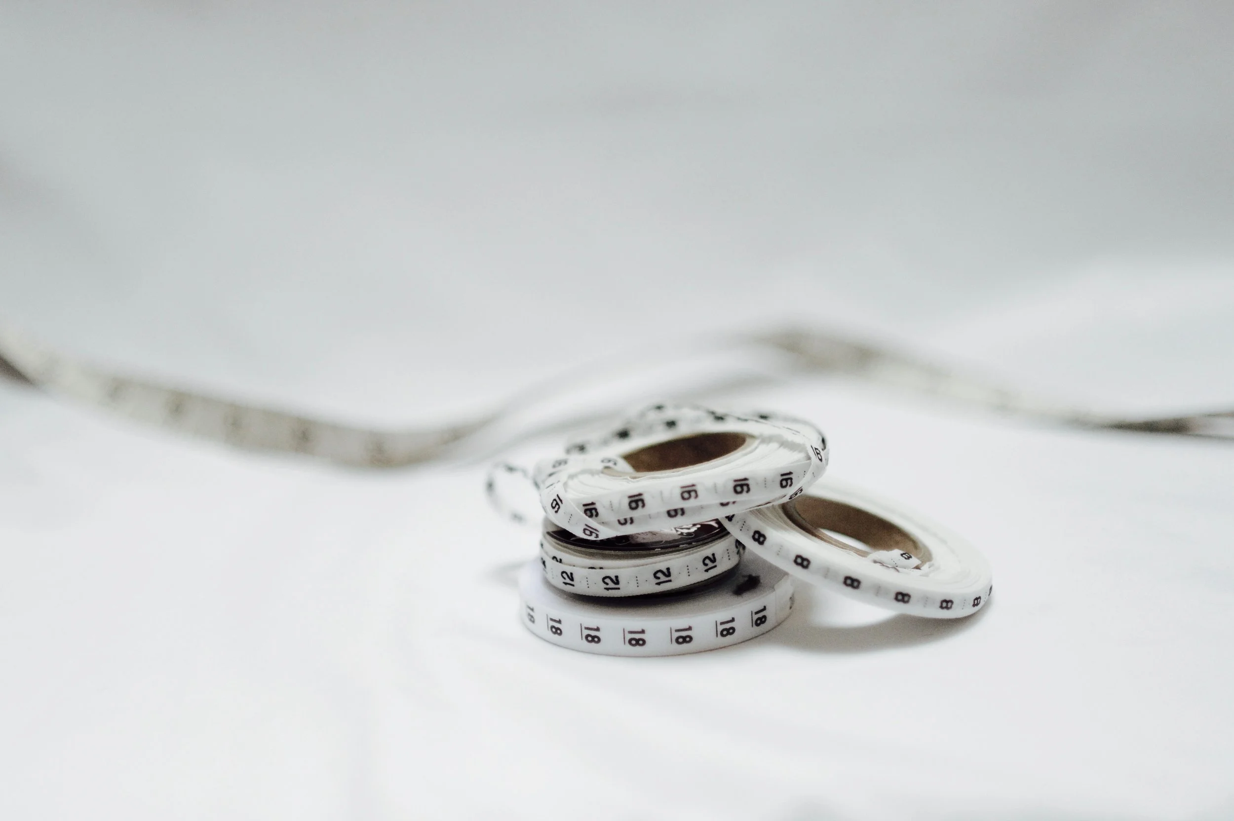 Dress size labels on a table-top