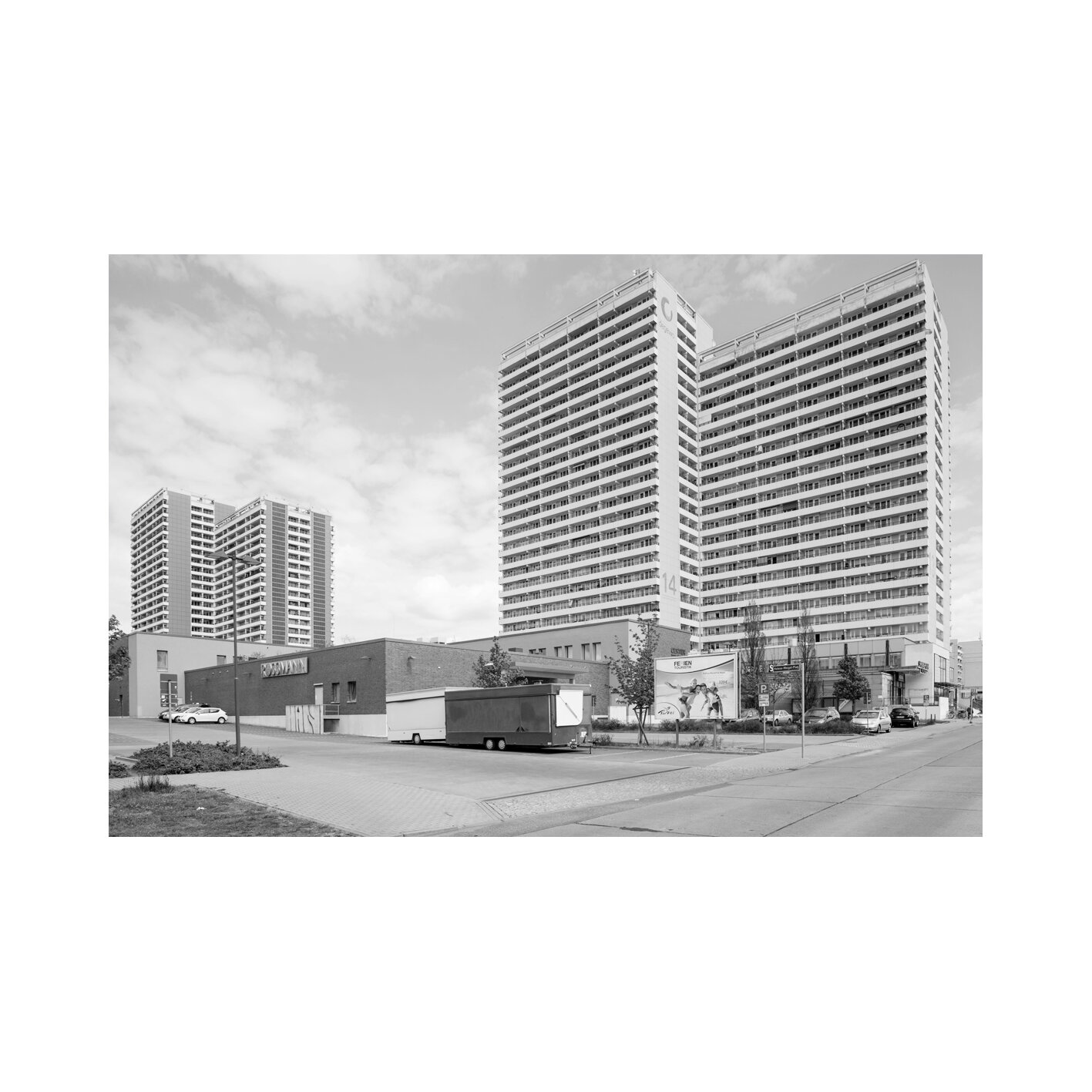 A vast territorial reconnaissance where the Plattenbau dominates the landscape. A monumental plasticity in the anonymous shape of East-Berlin prefab buildings.