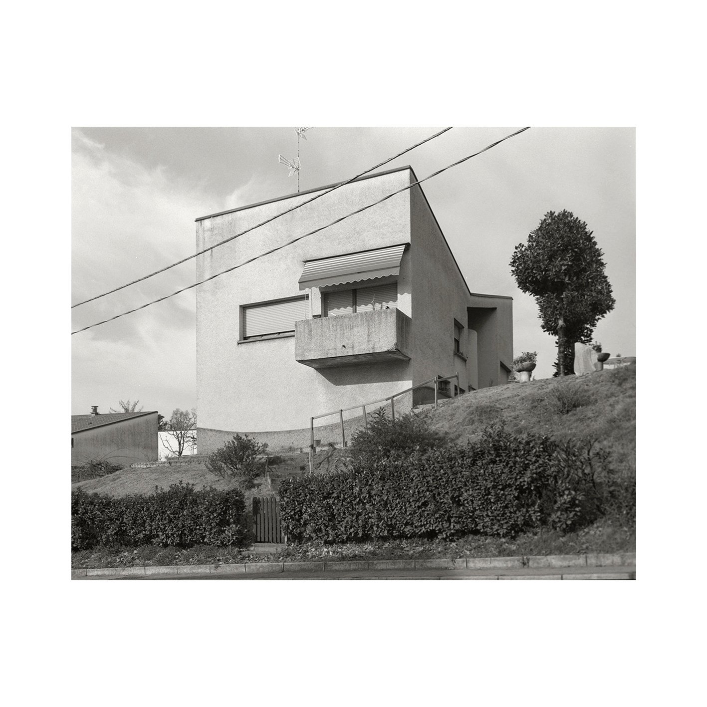 A photographic journey beyond the confines of Como's city walls, exploring its peri-urban and marginal areas, far from the bustling tourist hub it has become, delving into the overlooked corners, capturing the essence of the outskirts, where the p